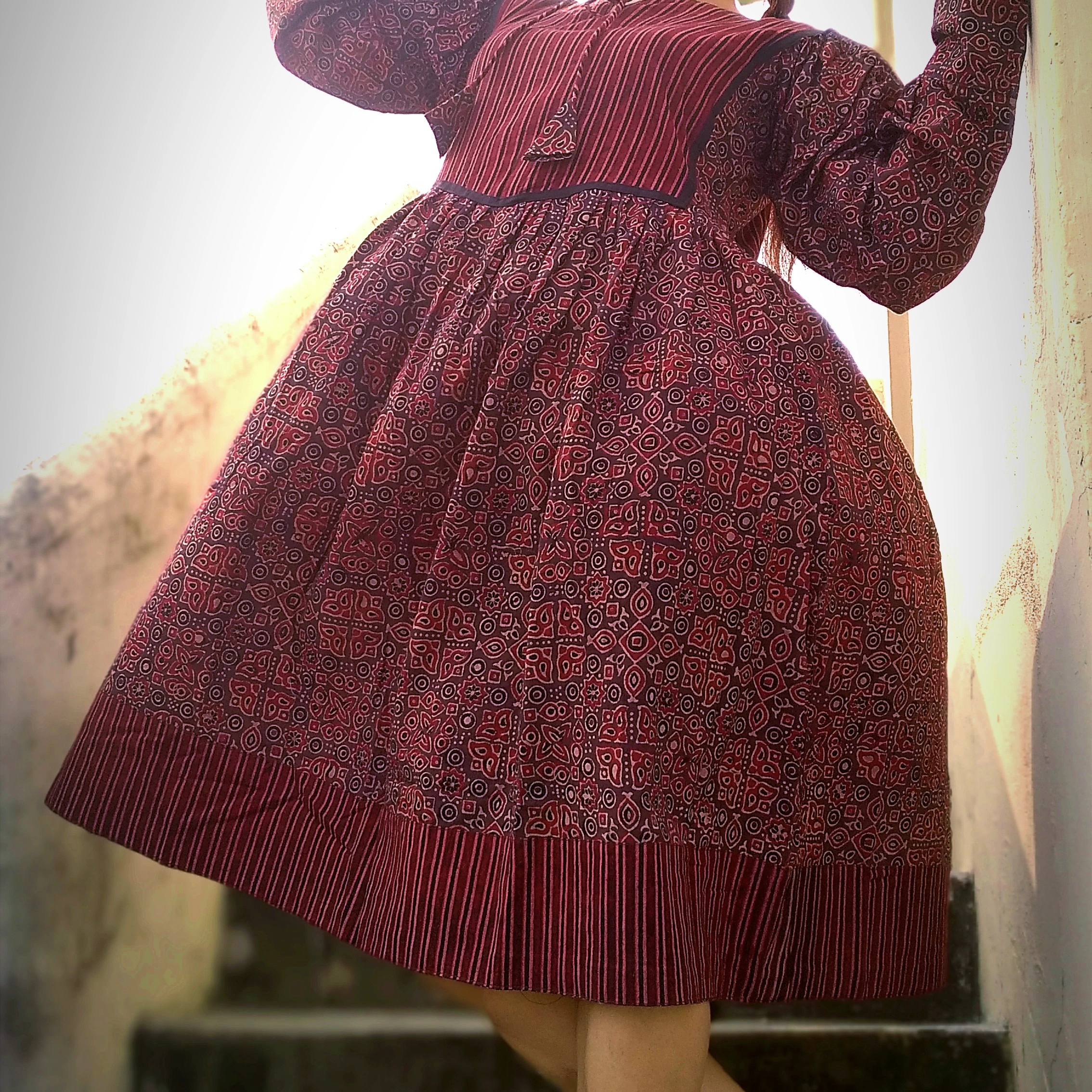 KHIVA  -Loose fit, Lantern Sleeves Ajrakh Printed Midi Dress with round stringed neck.