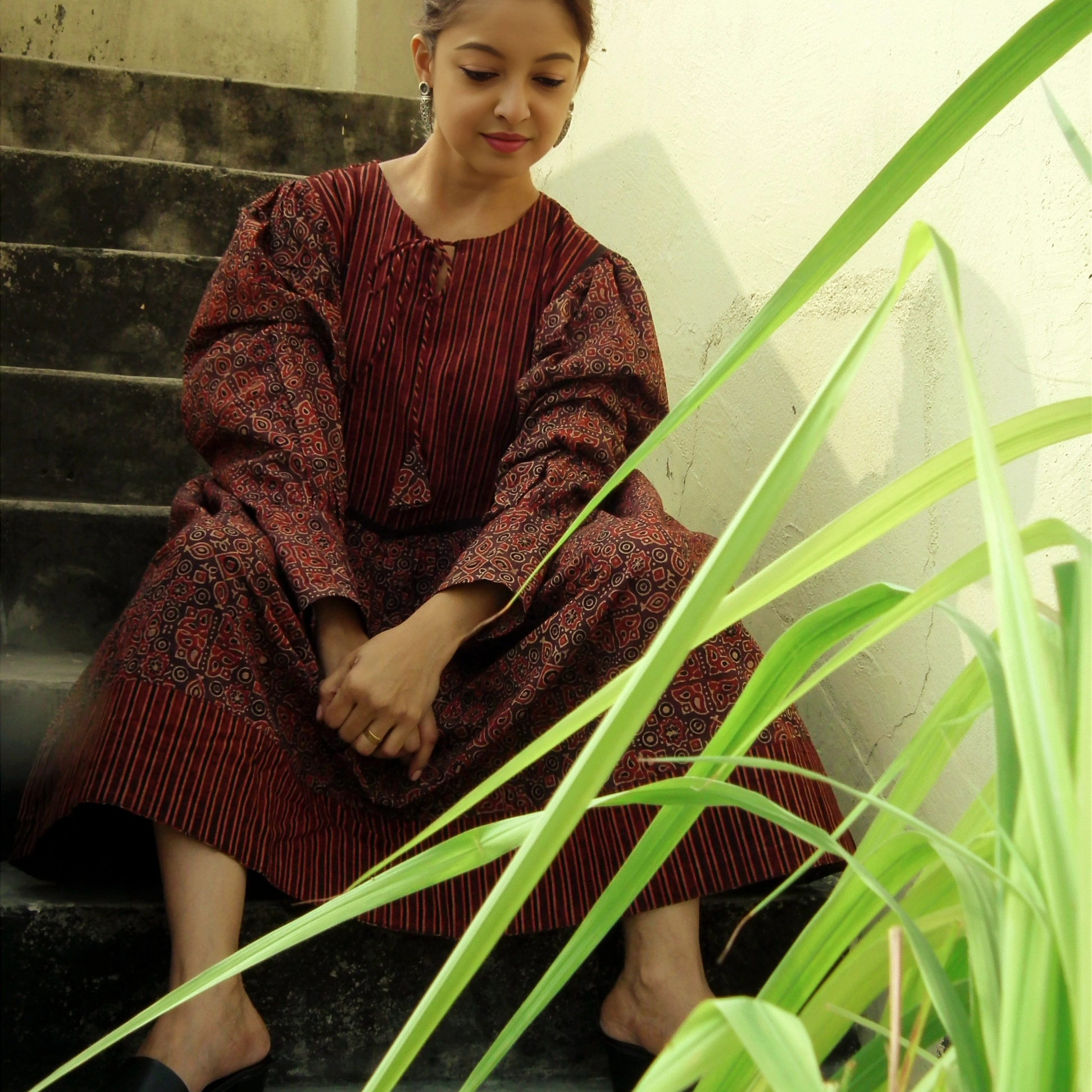 KHIVA  -Loose fit, Lantern Sleeves Ajrakh Printed Midi Dress with round stringed neck.