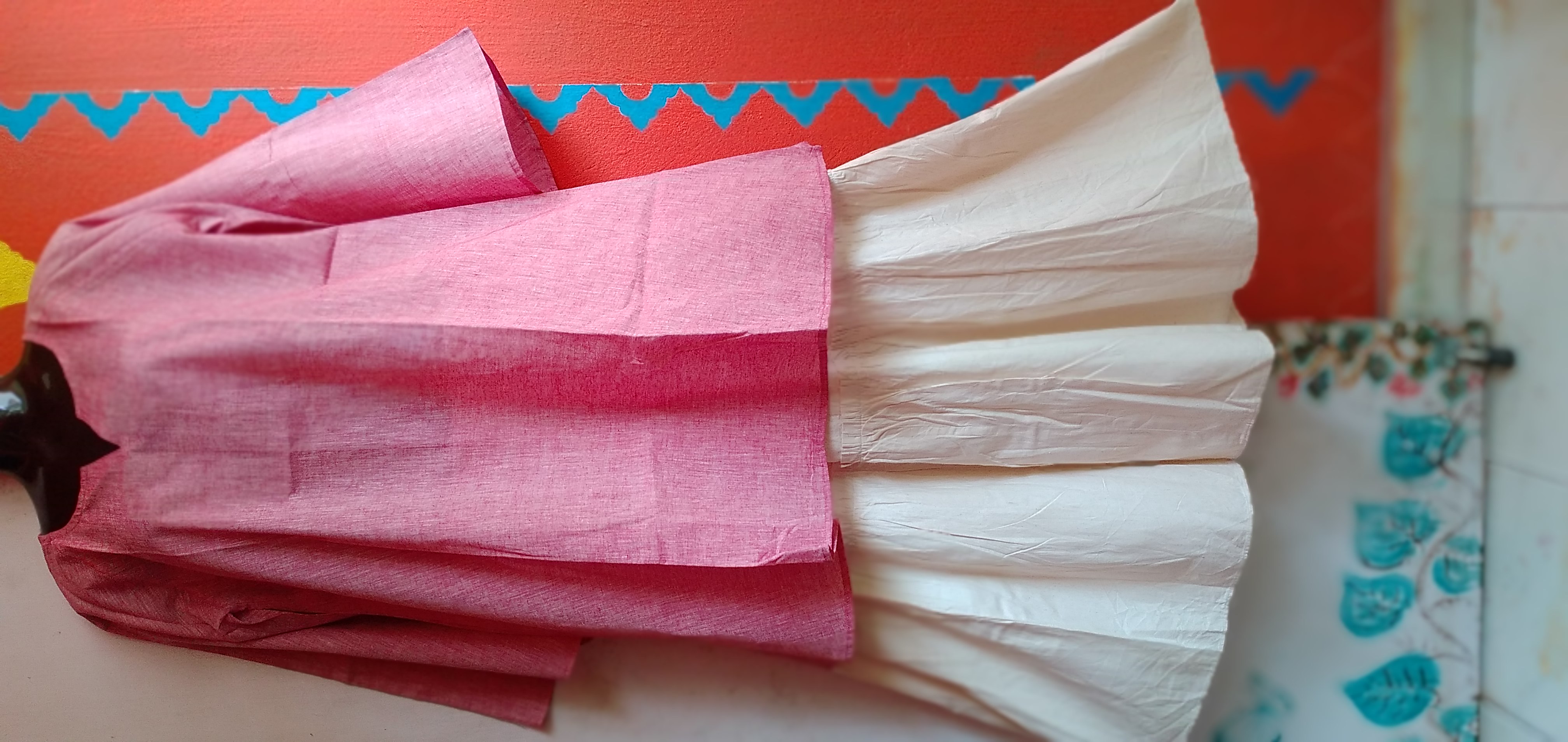 SUNNY BLISS - Peplum Hem Fitted pleated V Neck Sleeveless Top in Haze Red.