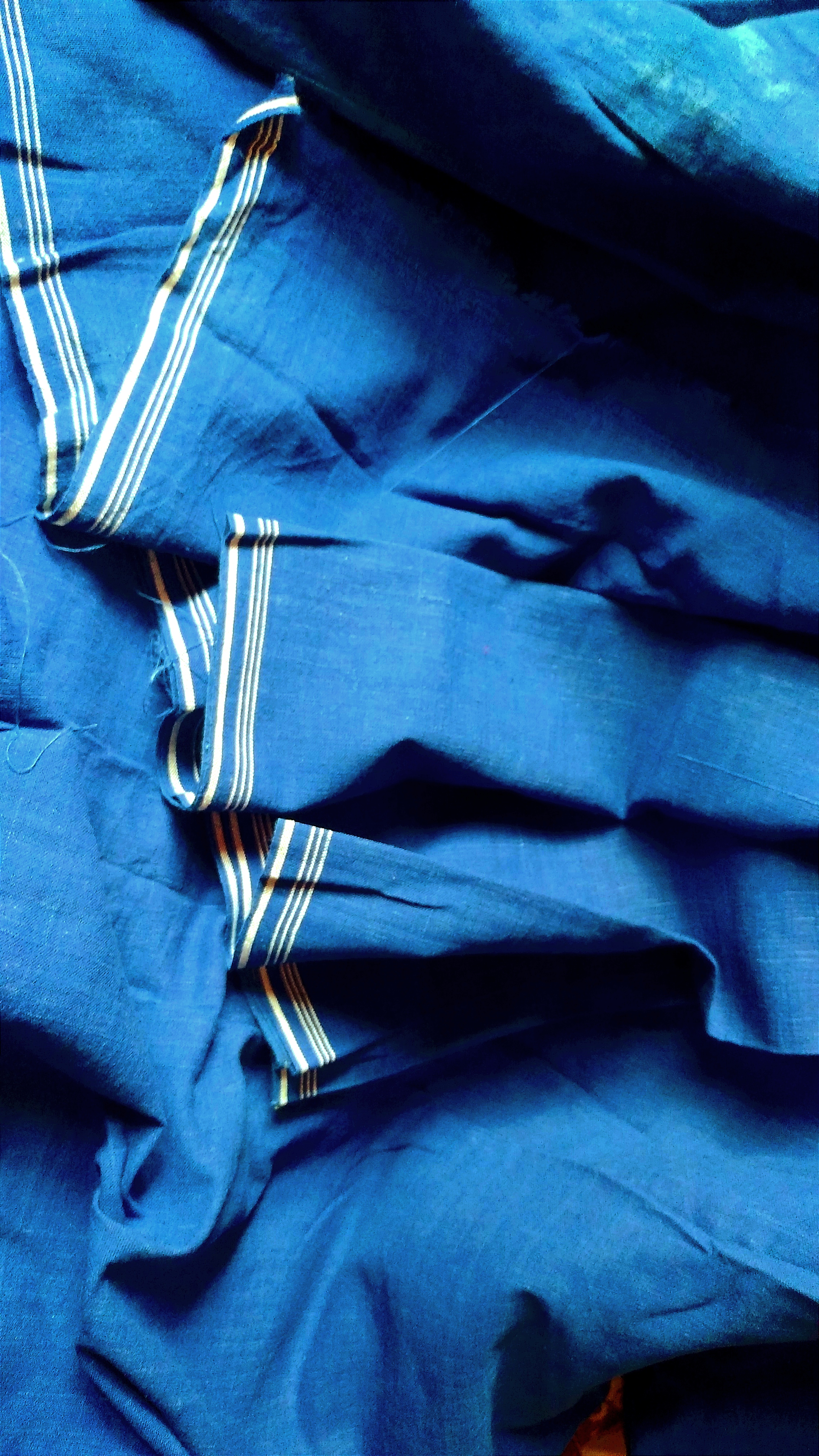 Organic Indigo Dyed 24DT Cotton Hand-Woven Solid tone Fabric.