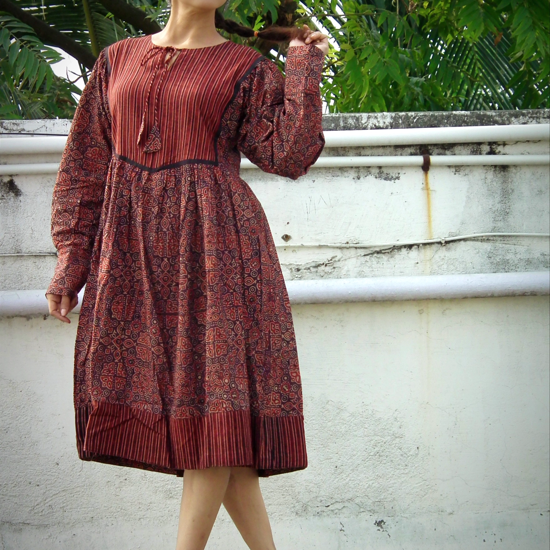 KHIVA  -Loose fit, Lantern Sleeves Ajrakh Printed Midi Dress with round stringed neck.