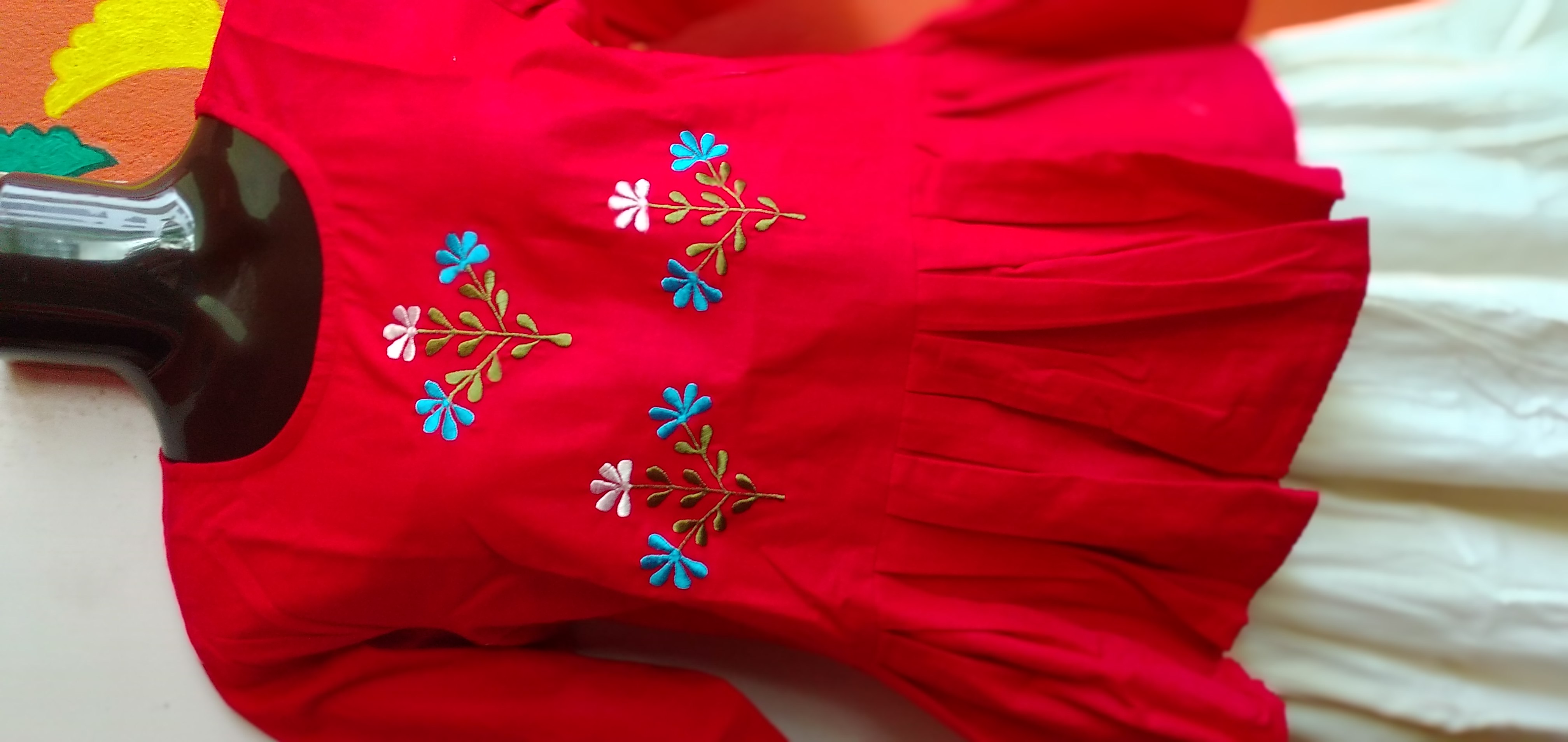 SUNNY BLISS - Peplum Hem Fitted pleated V Neck Sleeveless Top in Haze Red.