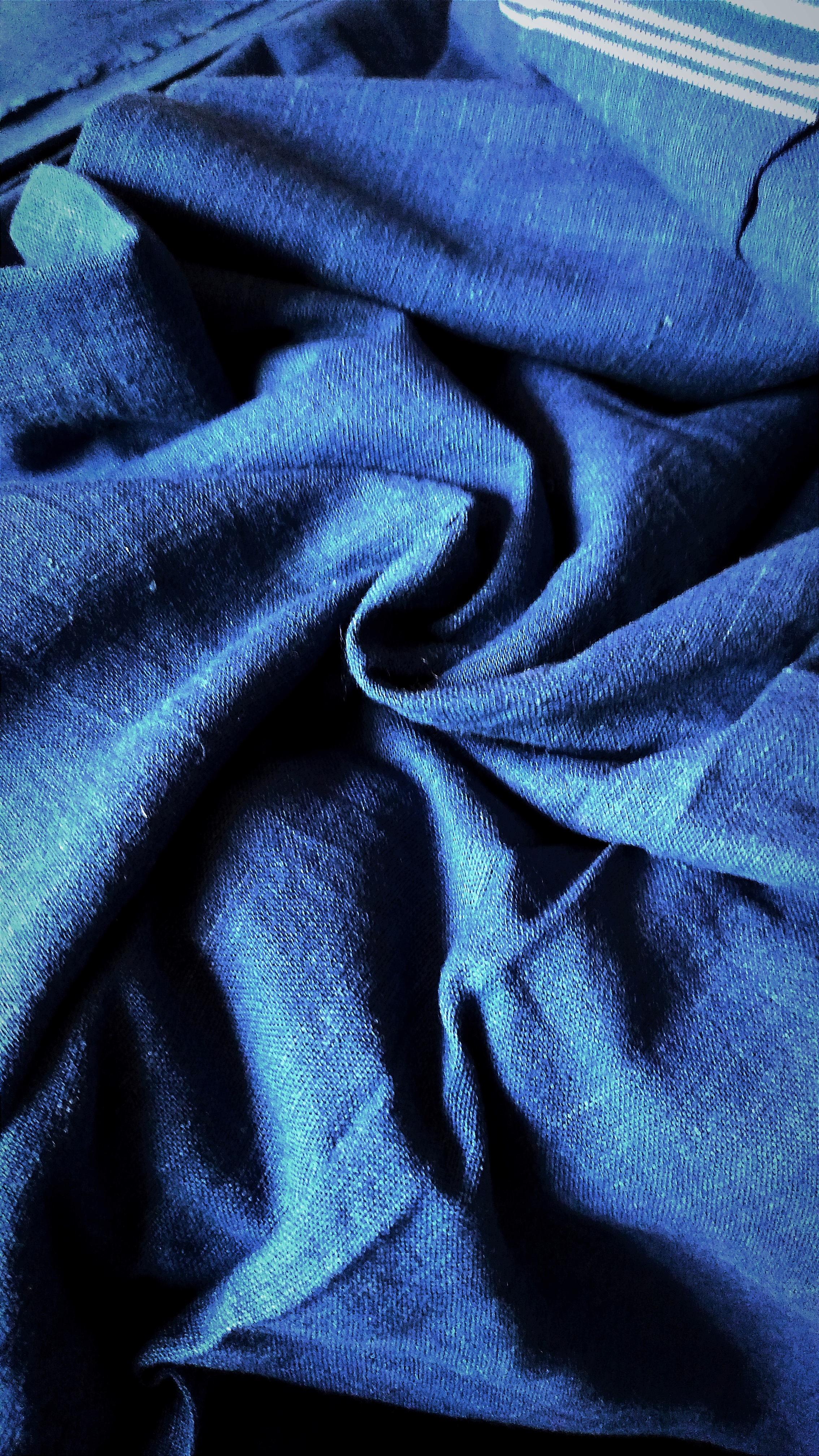 Organic Indigo Dyed 24DT Cotton Hand-Woven Solid tone Fabric.
