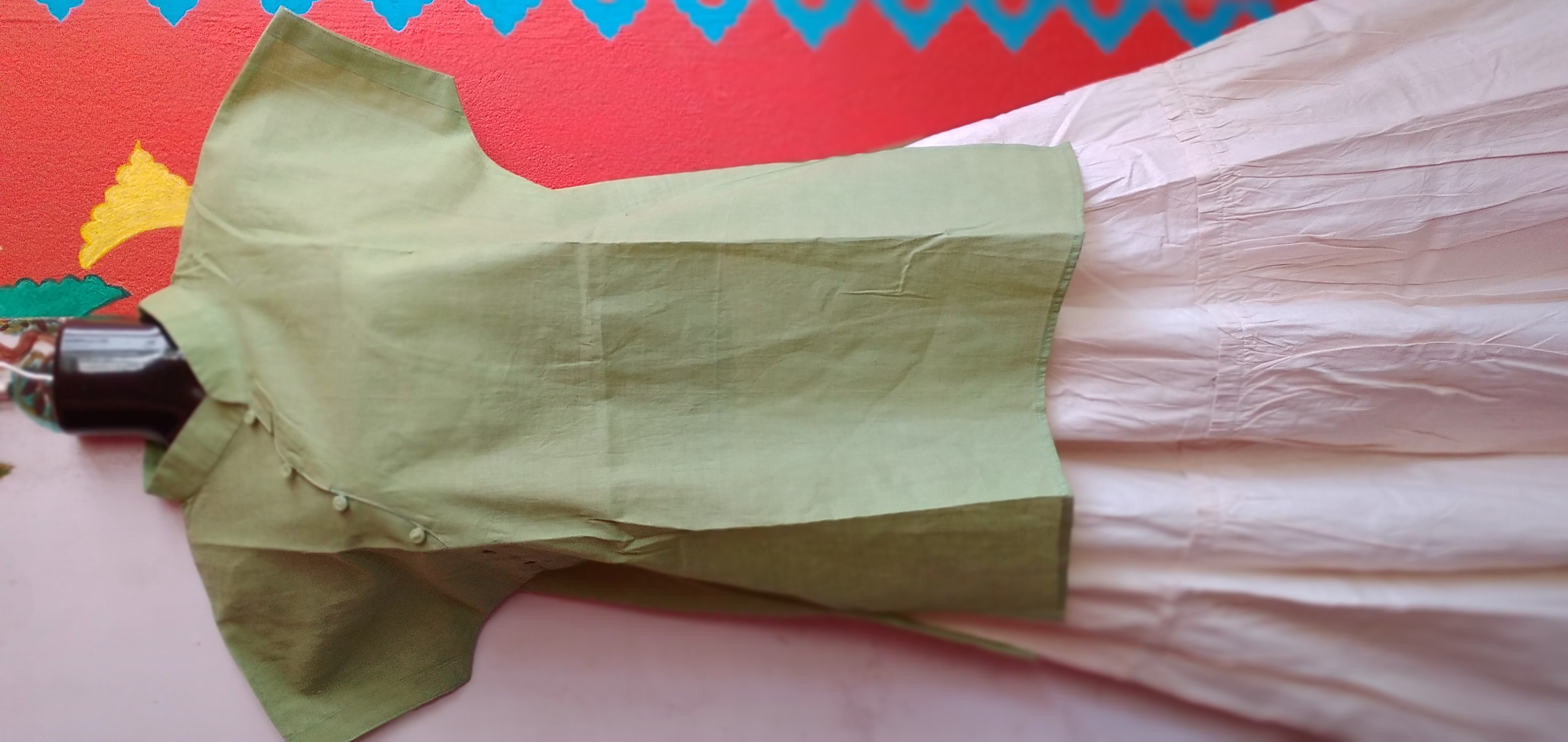 SUNNY BLISS - Peplum Hem Fitted pleated V Neck Sleeveless Top in Haze Red.