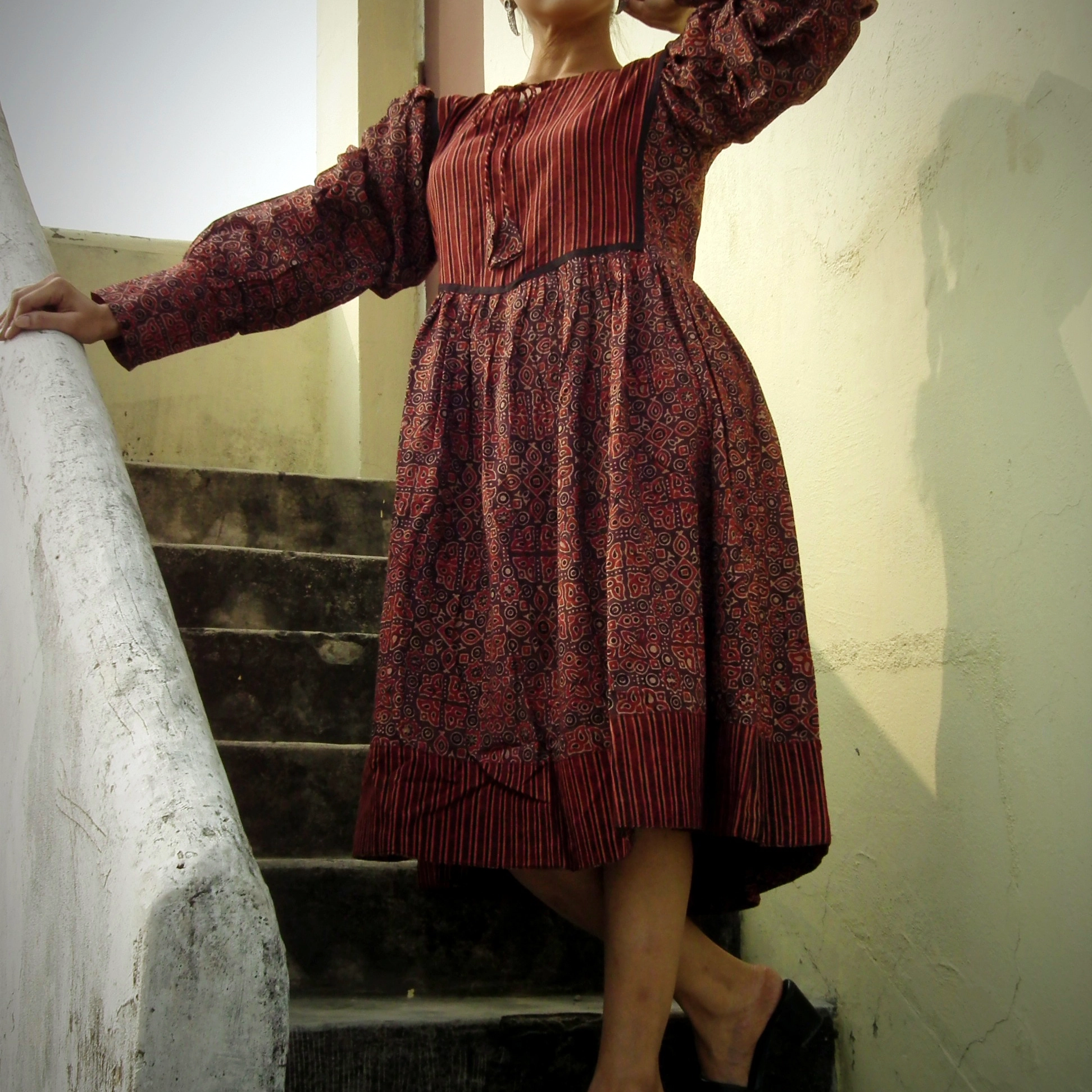 KHIVA -Loose fit, Lantern Sleeves Ajrakh Printed Midi Dress with round stringed neck.