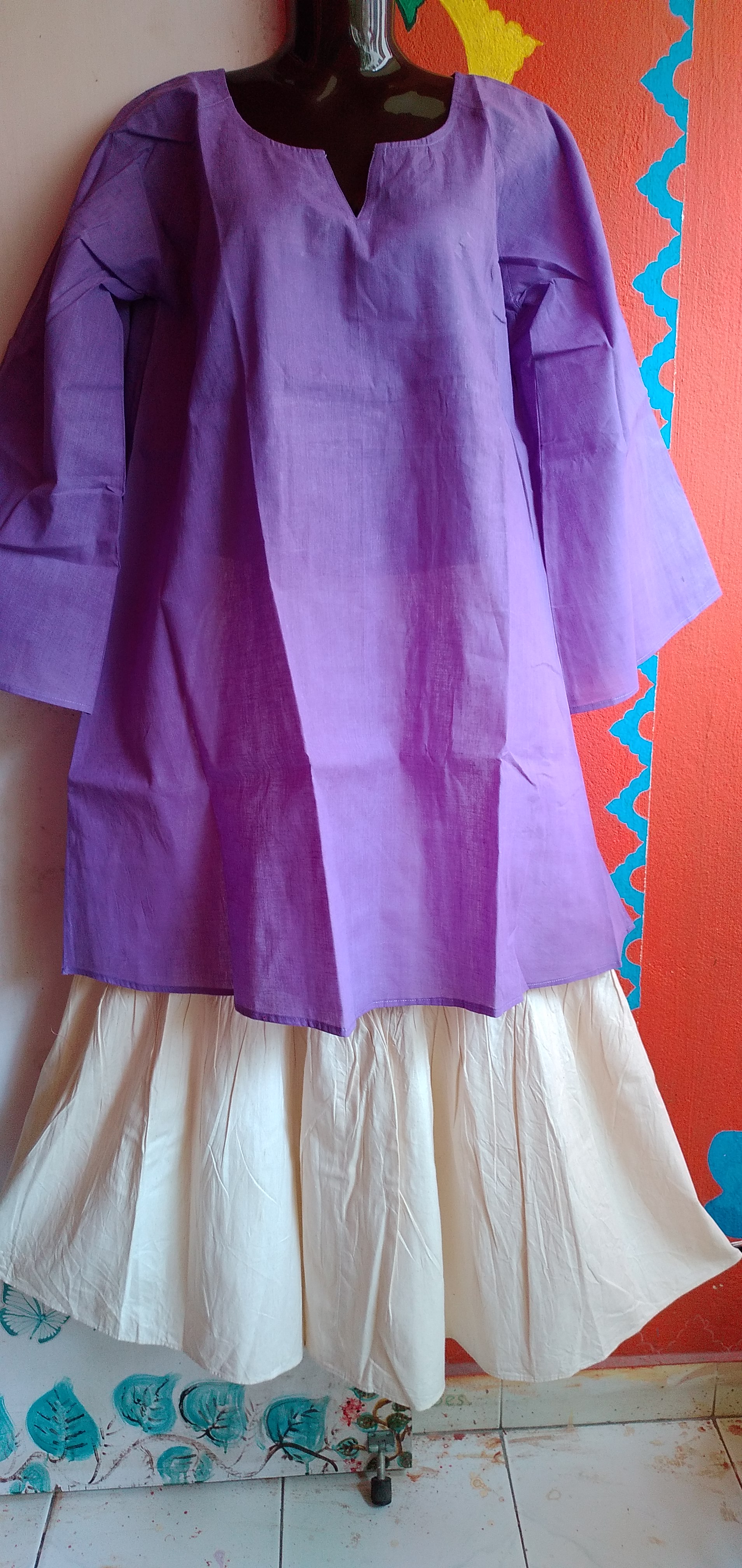 SUNNY BLISS - Peplum Hem Fitted pleated V Neck Sleeveless Top in Haze Red.