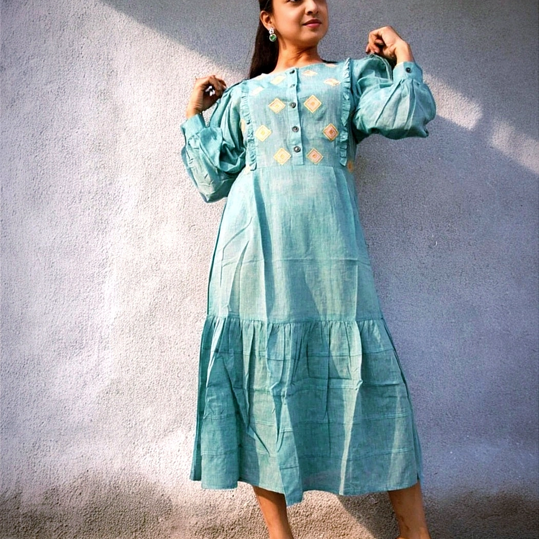 COASTLINE - Emerald Green Round Neck Embroidered Full Sleeved Tiered A-Line Dress.