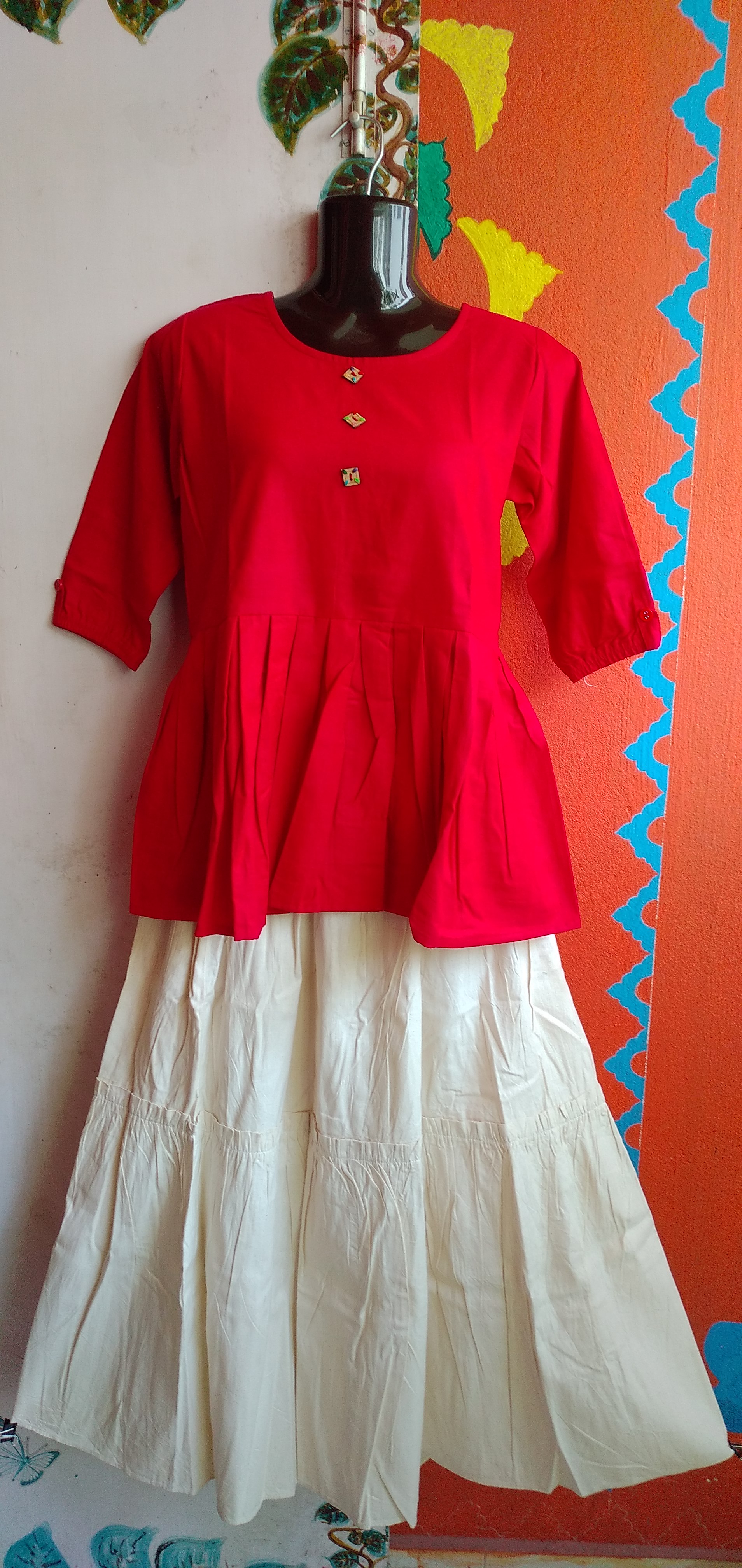 SUNNY BLISS - Peplum Hem Fitted pleated V Neck Sleeveless Top in Haze Red.