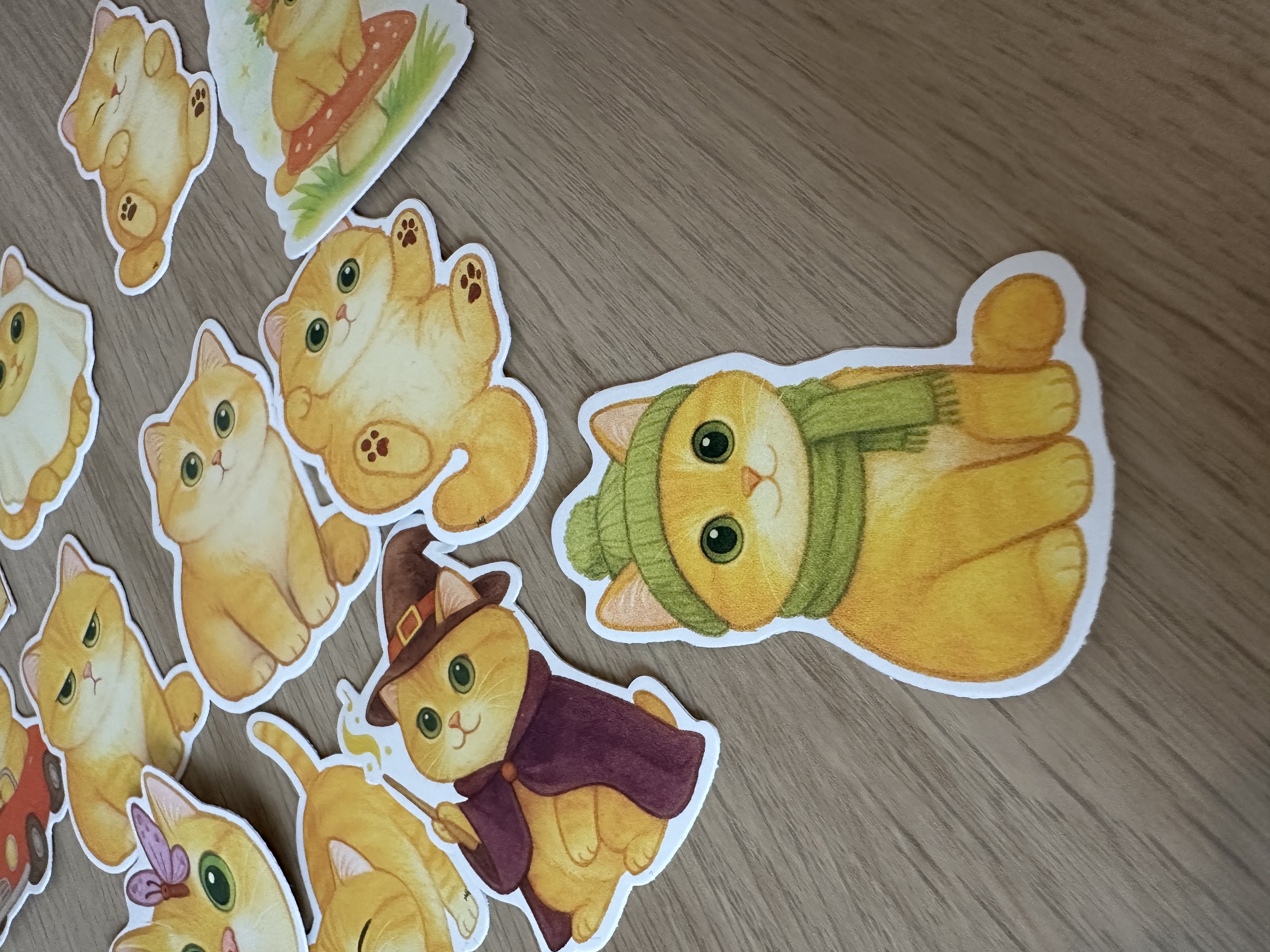 Cozy Cat Sticker with Green Scarf – Cute Winter Cat Vinyl Sticker for Laptop, Journal, Water Bottle & Scrapbooking