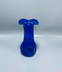 Handcrafted decorative vase in vibrant blue