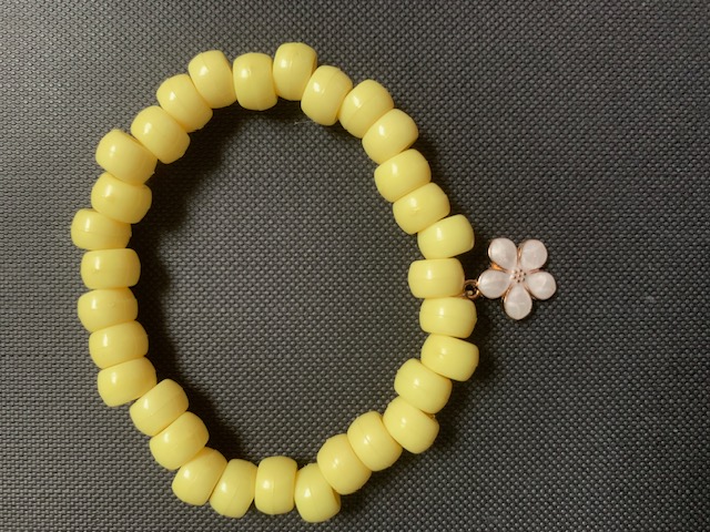 yellow bracelet with flower