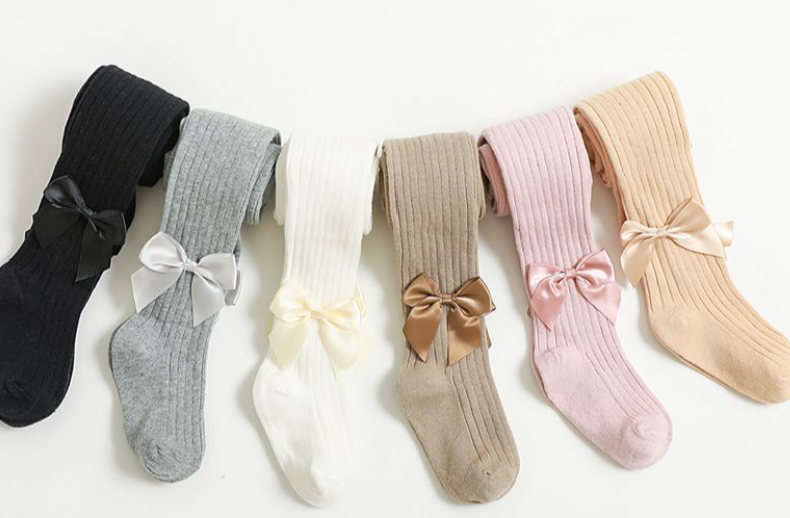 White ribbed tights with bow
