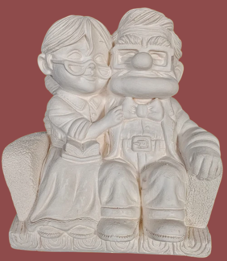 Pareja de ancianos en sofá