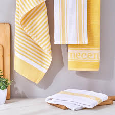 Yellow and white kitchen towels