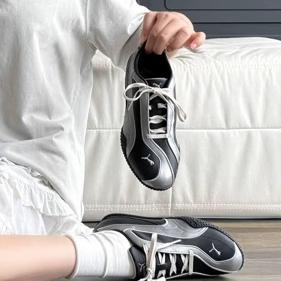 Puma Black and Silver Sneakers