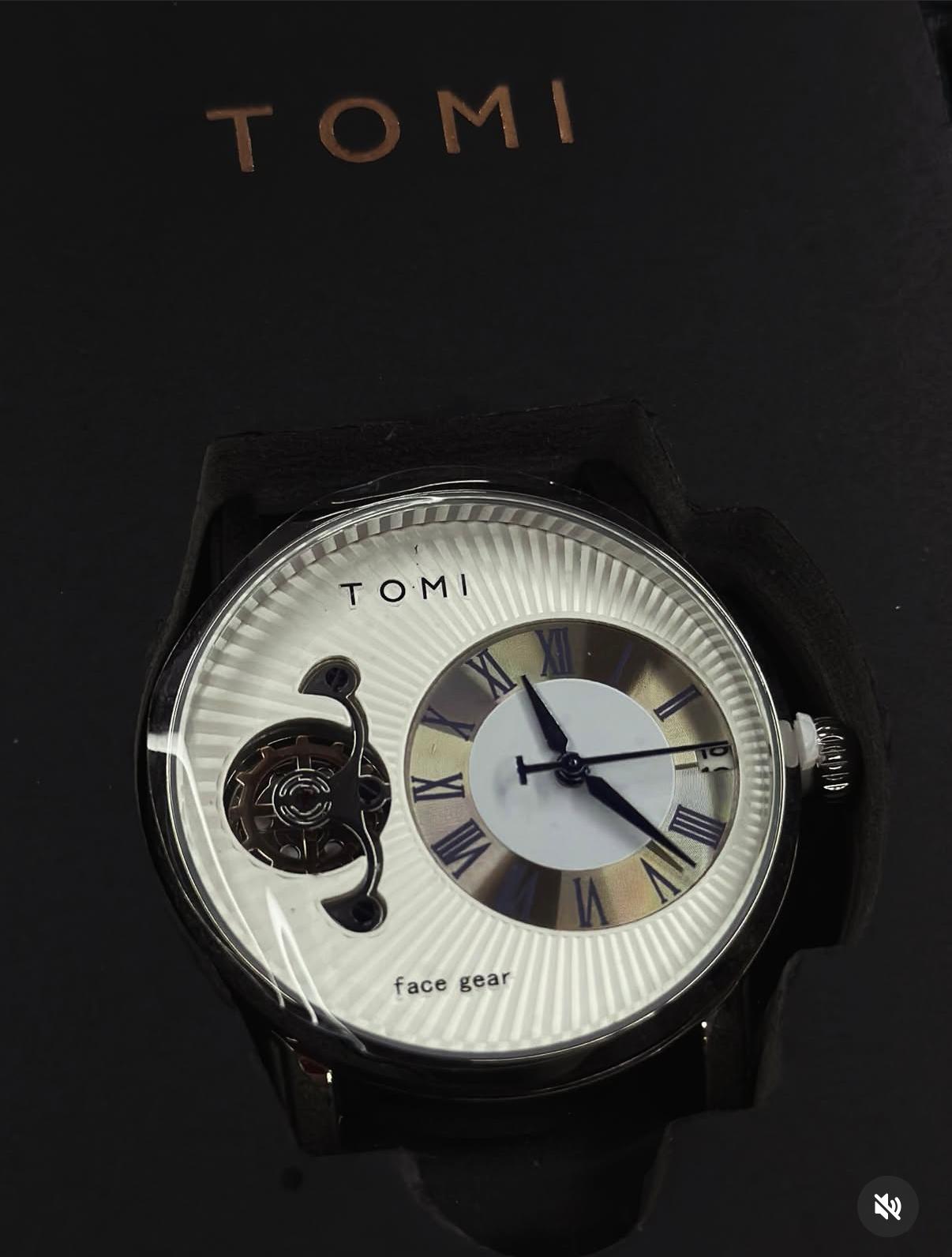 Reloj TOMI