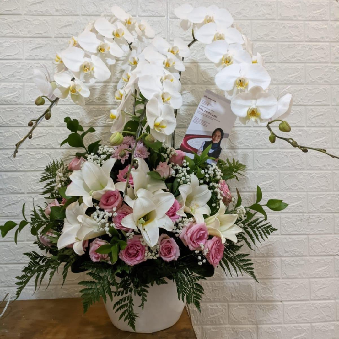 Elegant Orchid and Rose Flower Arrangement