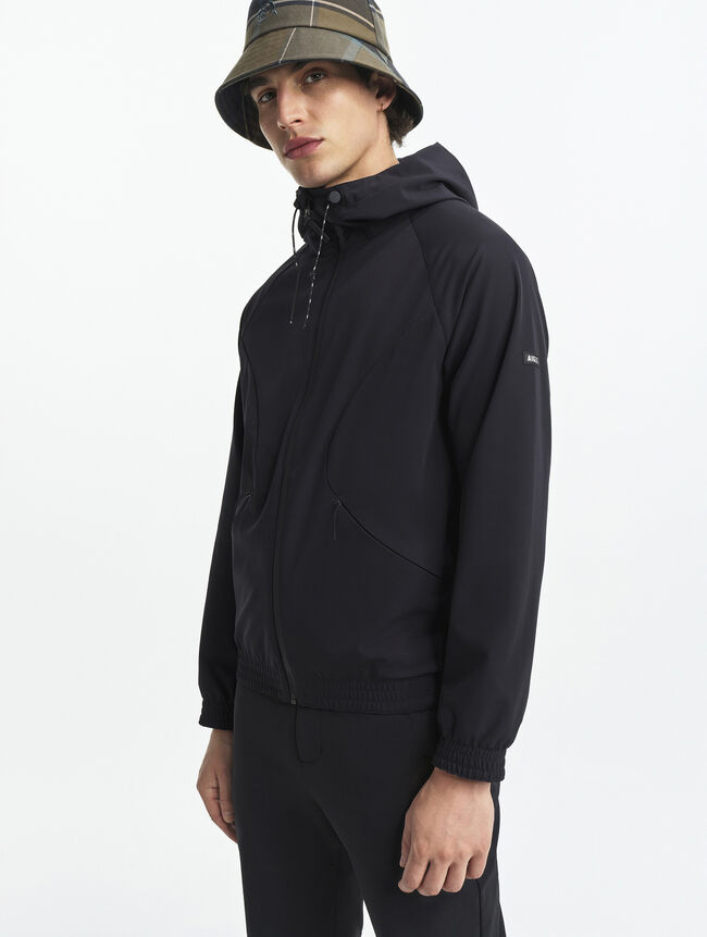 Veste zippée softshell à capuche coupe-vent De chez Aigle 