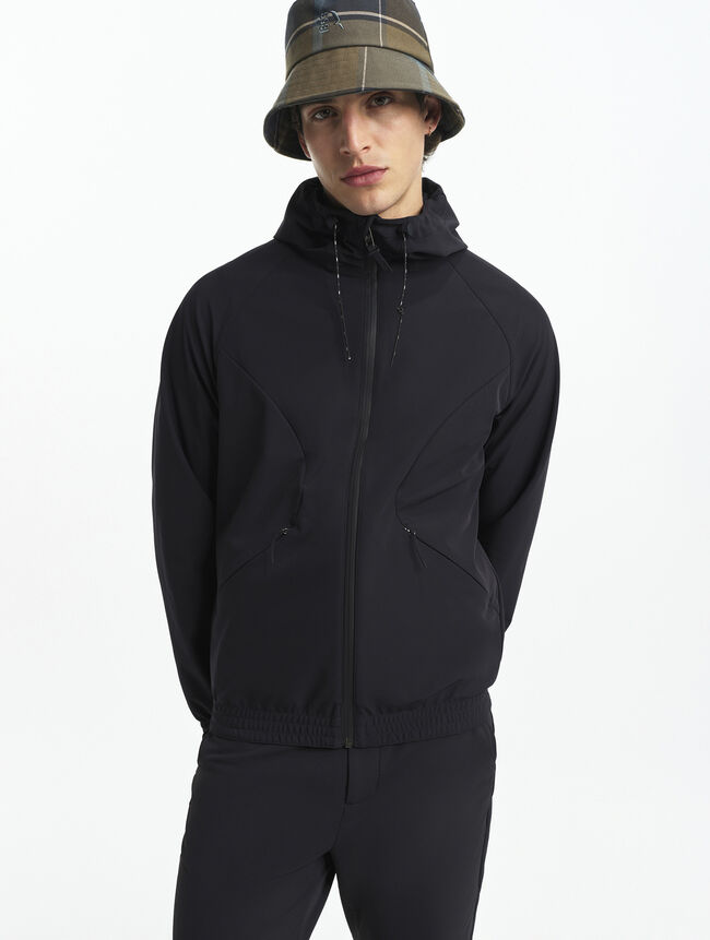Veste zippée softshell à capuche coupe-vent De chez Aigle