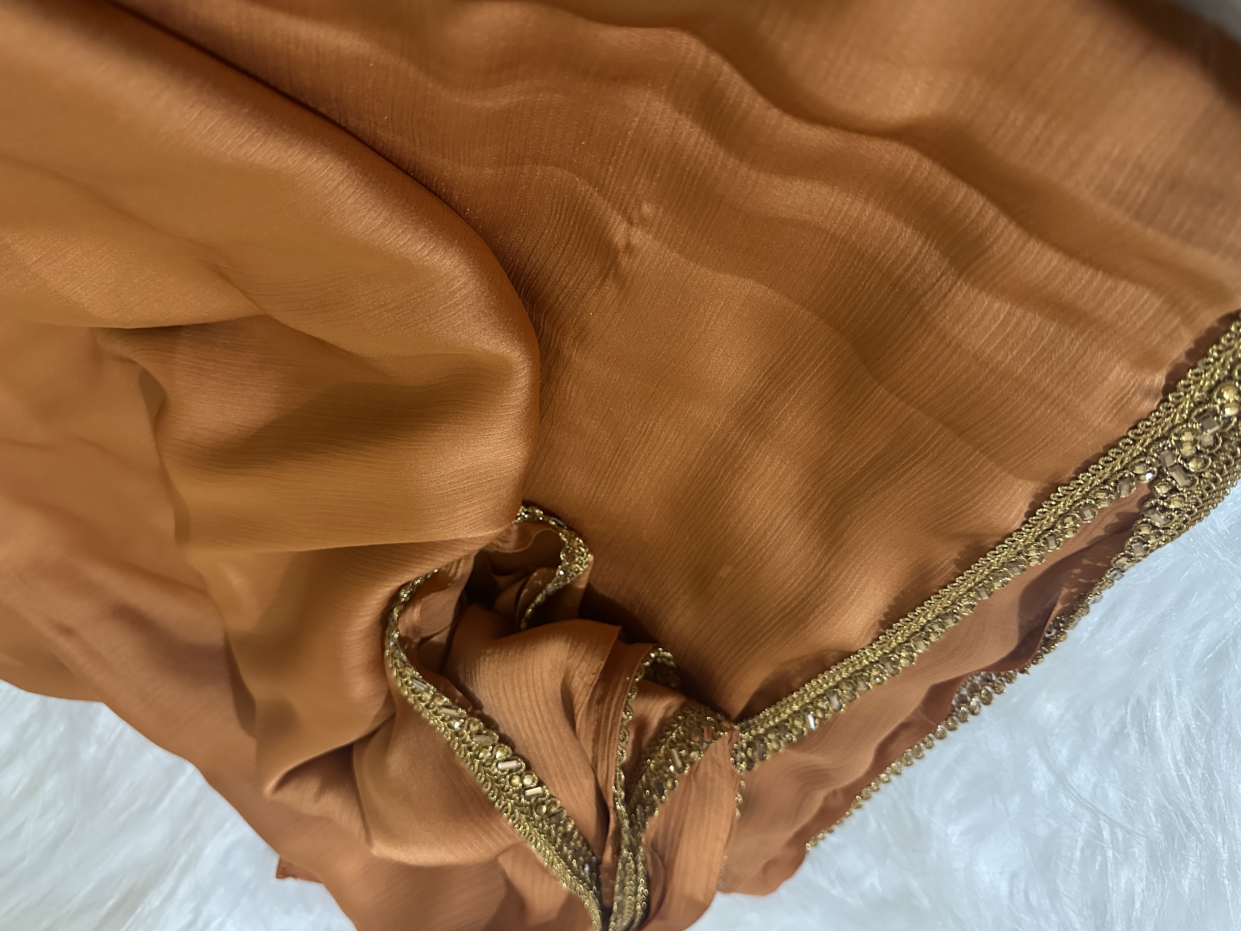 Elegant Sunset Peach Wrinkle Chiffon Saree