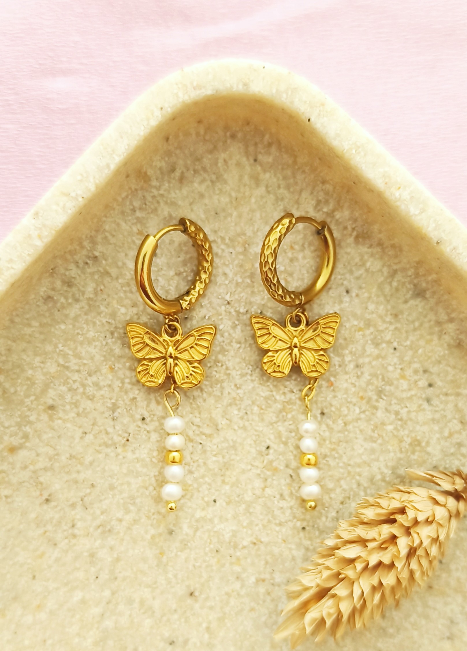 Vlinder en parel oorbellen