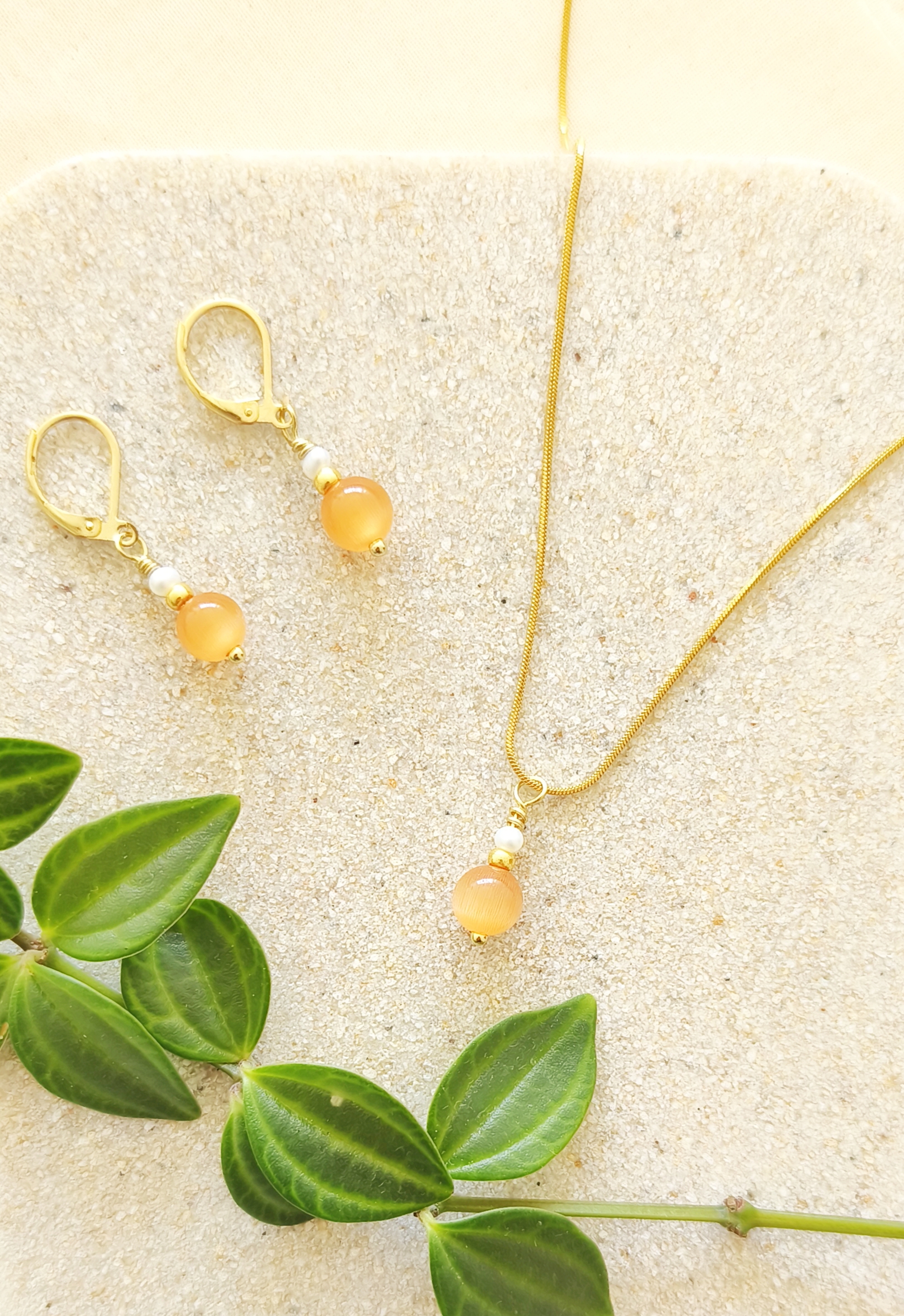 Oranje cateye ketting