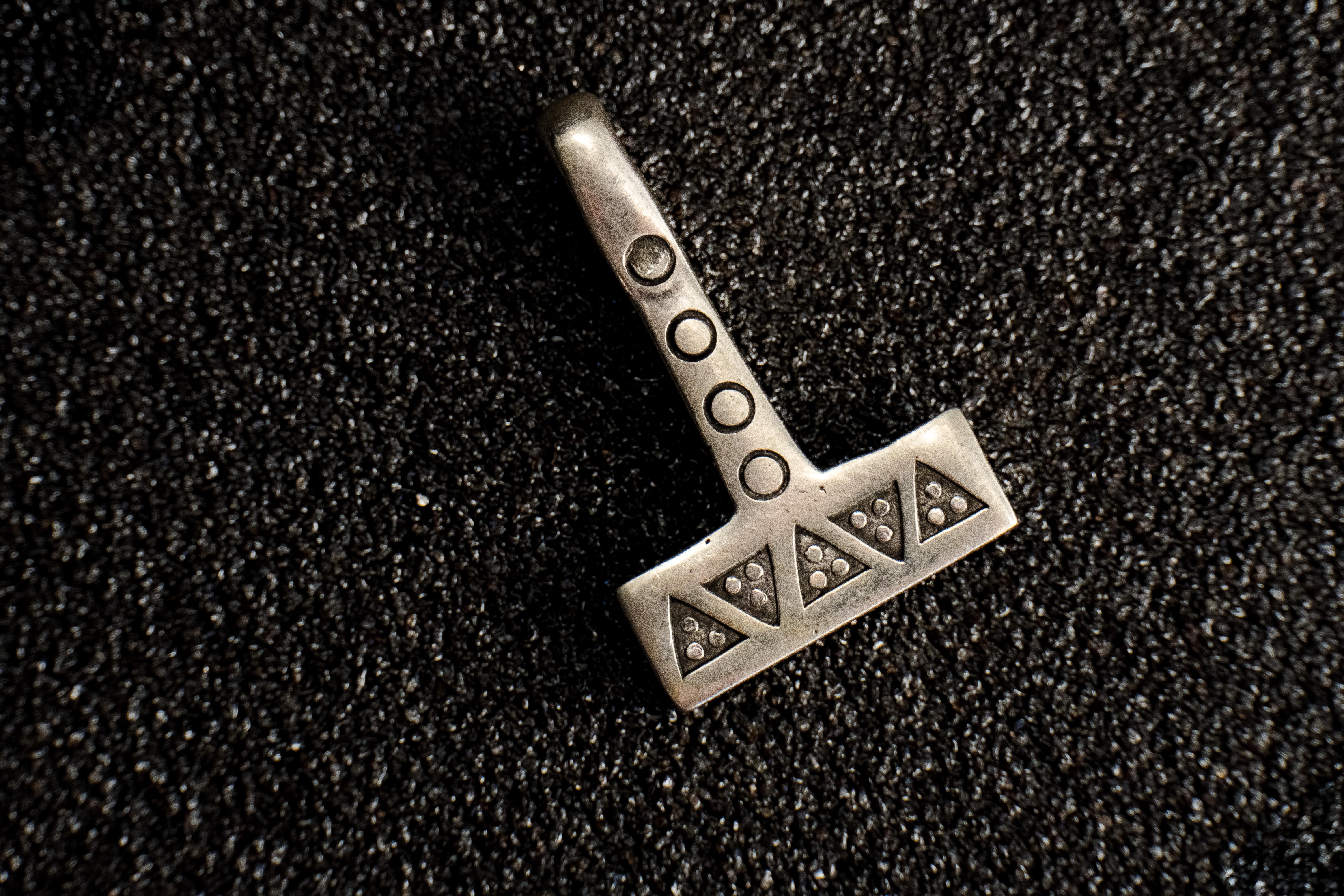 Silver Mjolnir Pendant – Wolf Tooth & Solar Viking Hammer