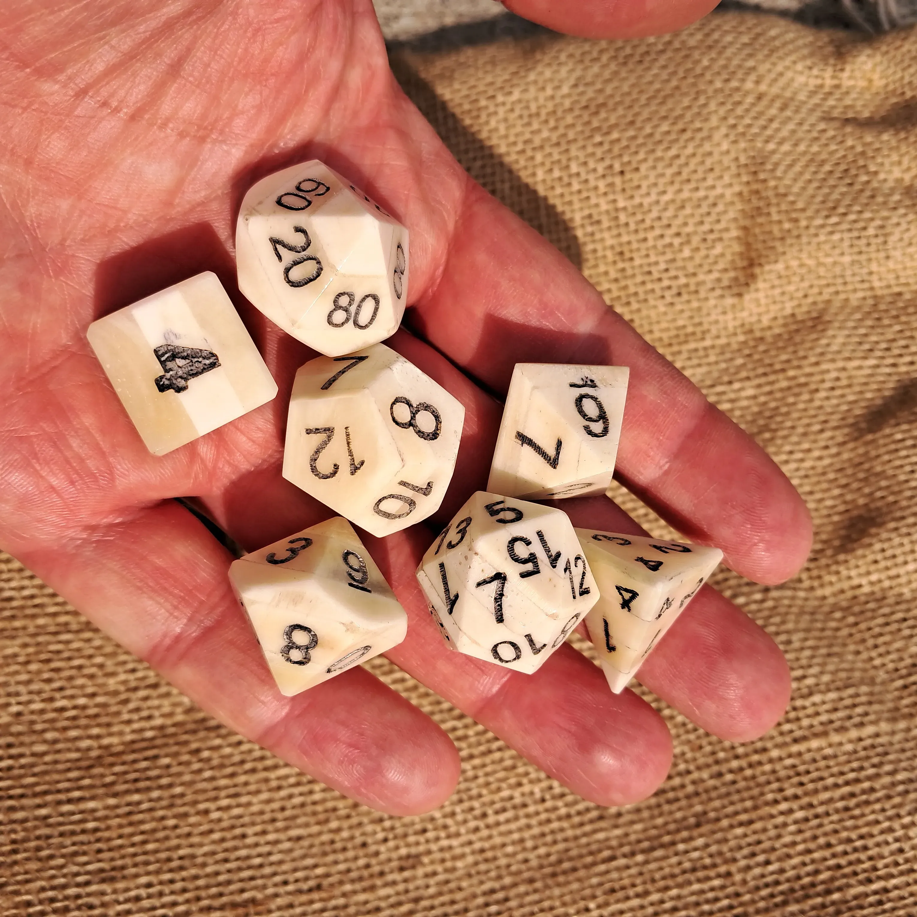 ​Hand-Carved Patinated Cattle Bone DnD Dice Set – Unique Artisan Dice for Role-Playing Games