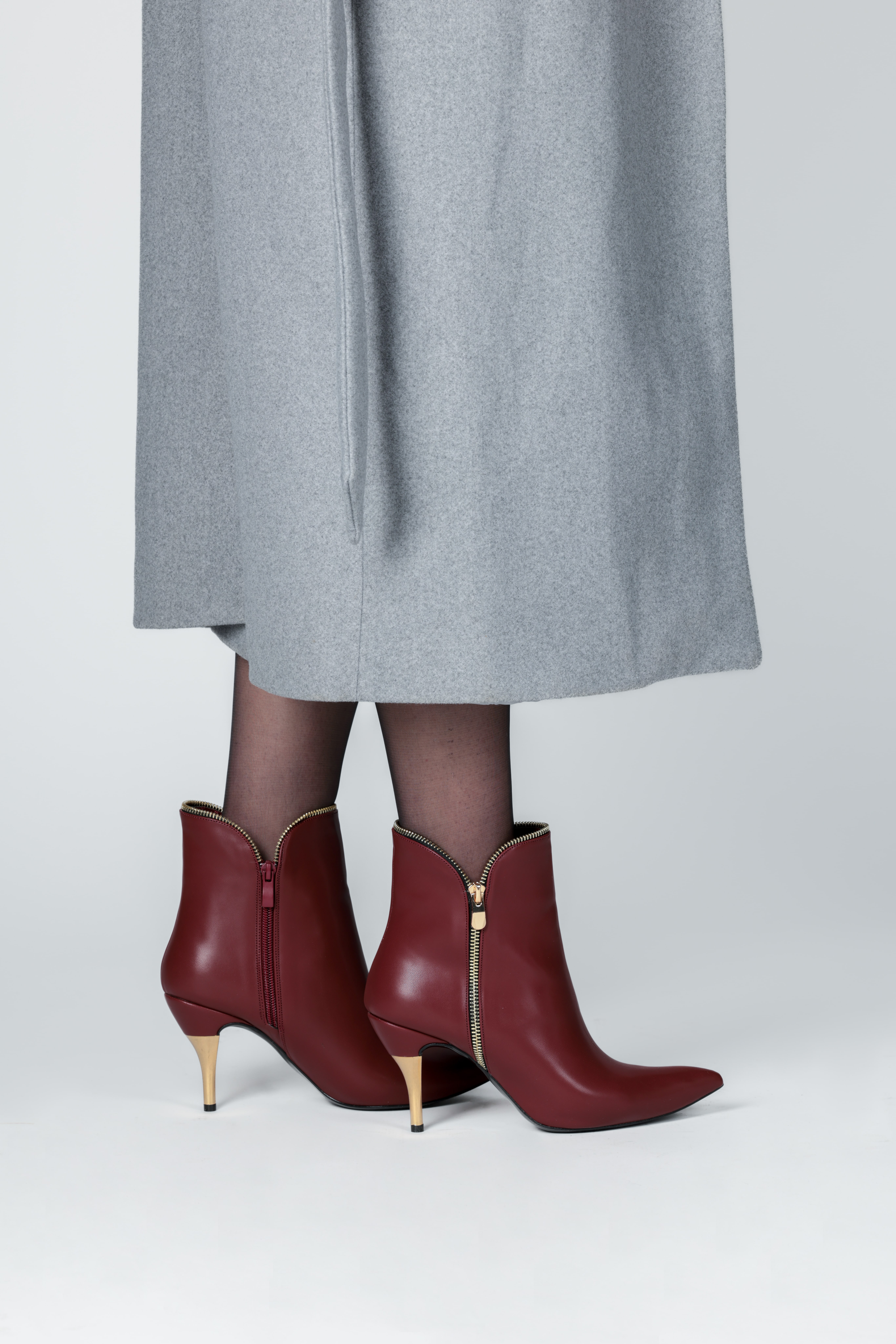 Bordo fermuar detaylı topuklu bot