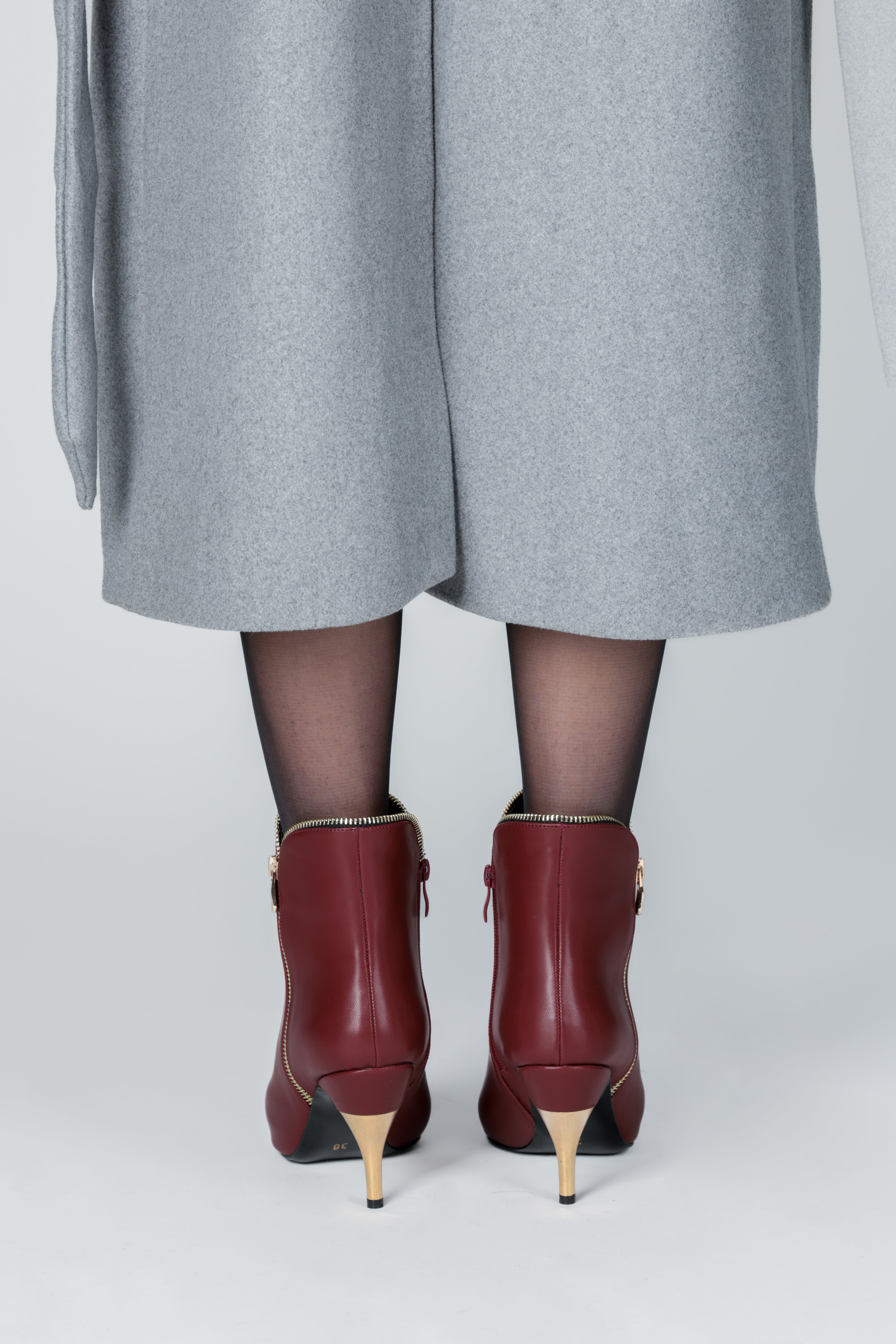 Bordo fermuar detaylı topuklu bot