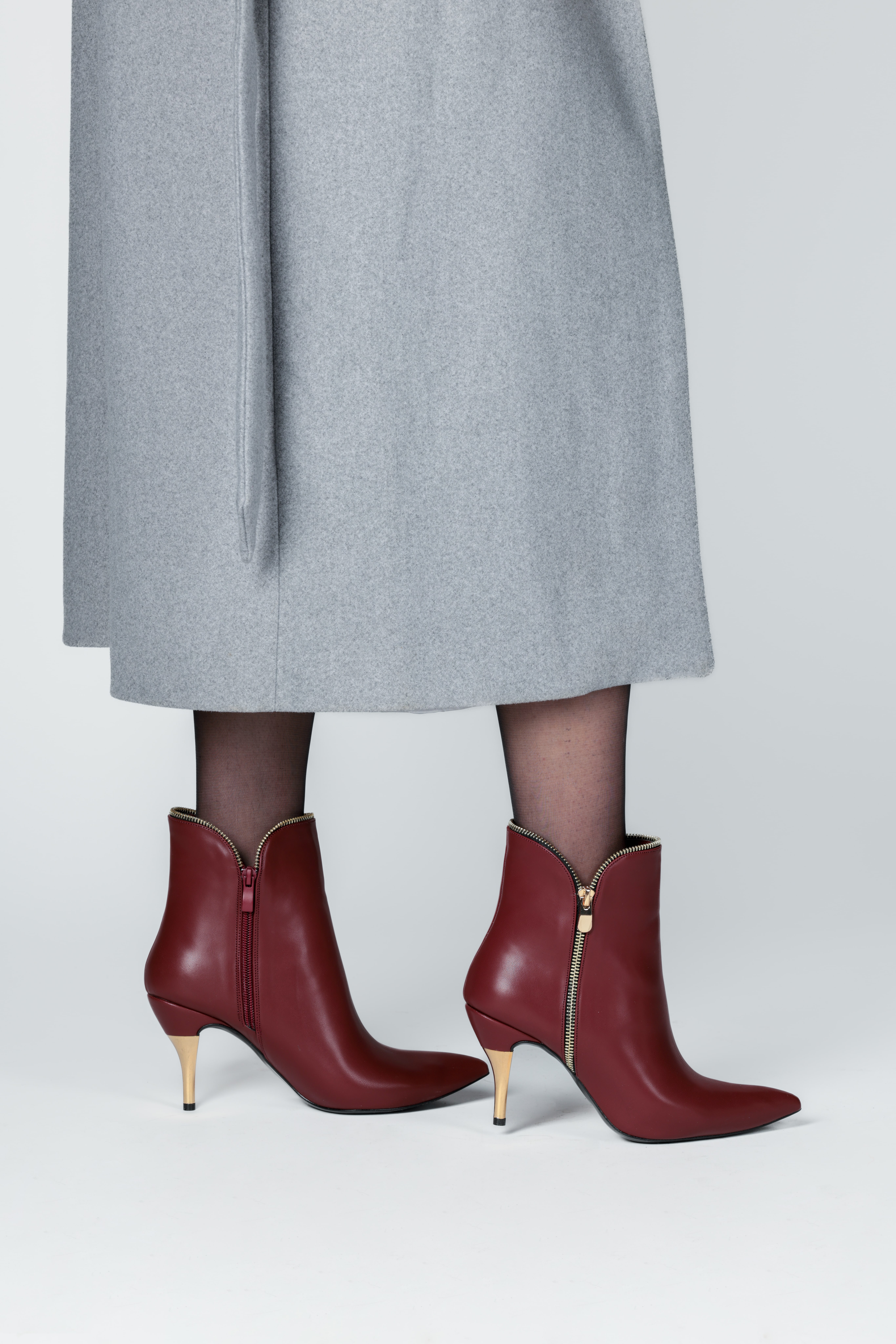 Bordo fermuar detaylı topuklu bot