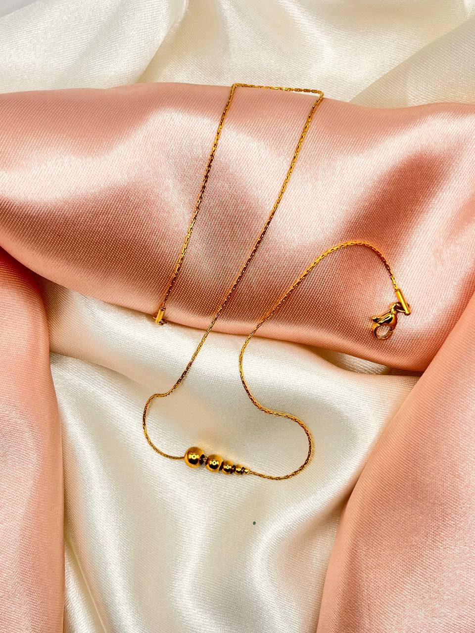 Elegant Gold Bead Necklace