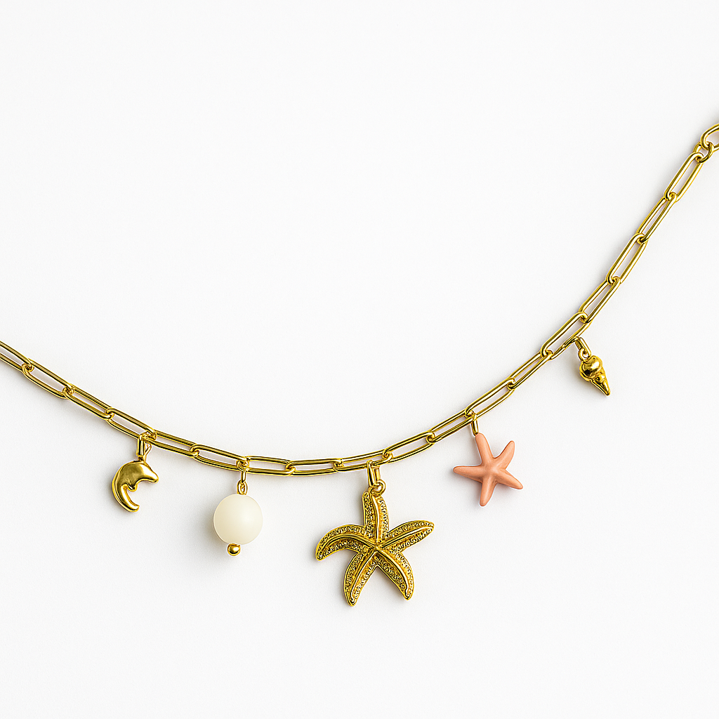 Chevillière doré avec pendentifs marins