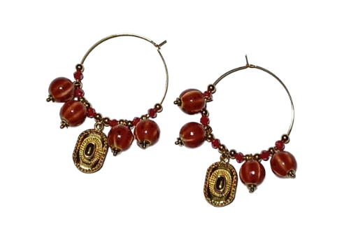 Boucles d'oreilles créoles dorées avec perles rouges
