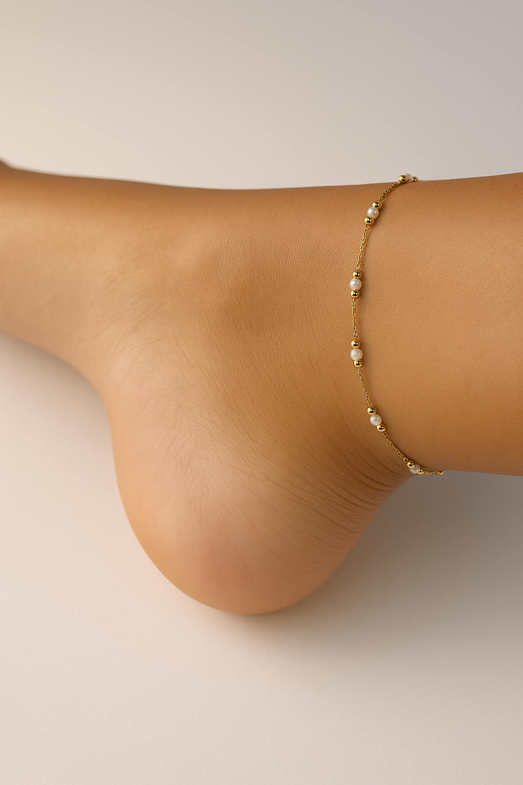 Chevillière acier inoxydable doré avec perles