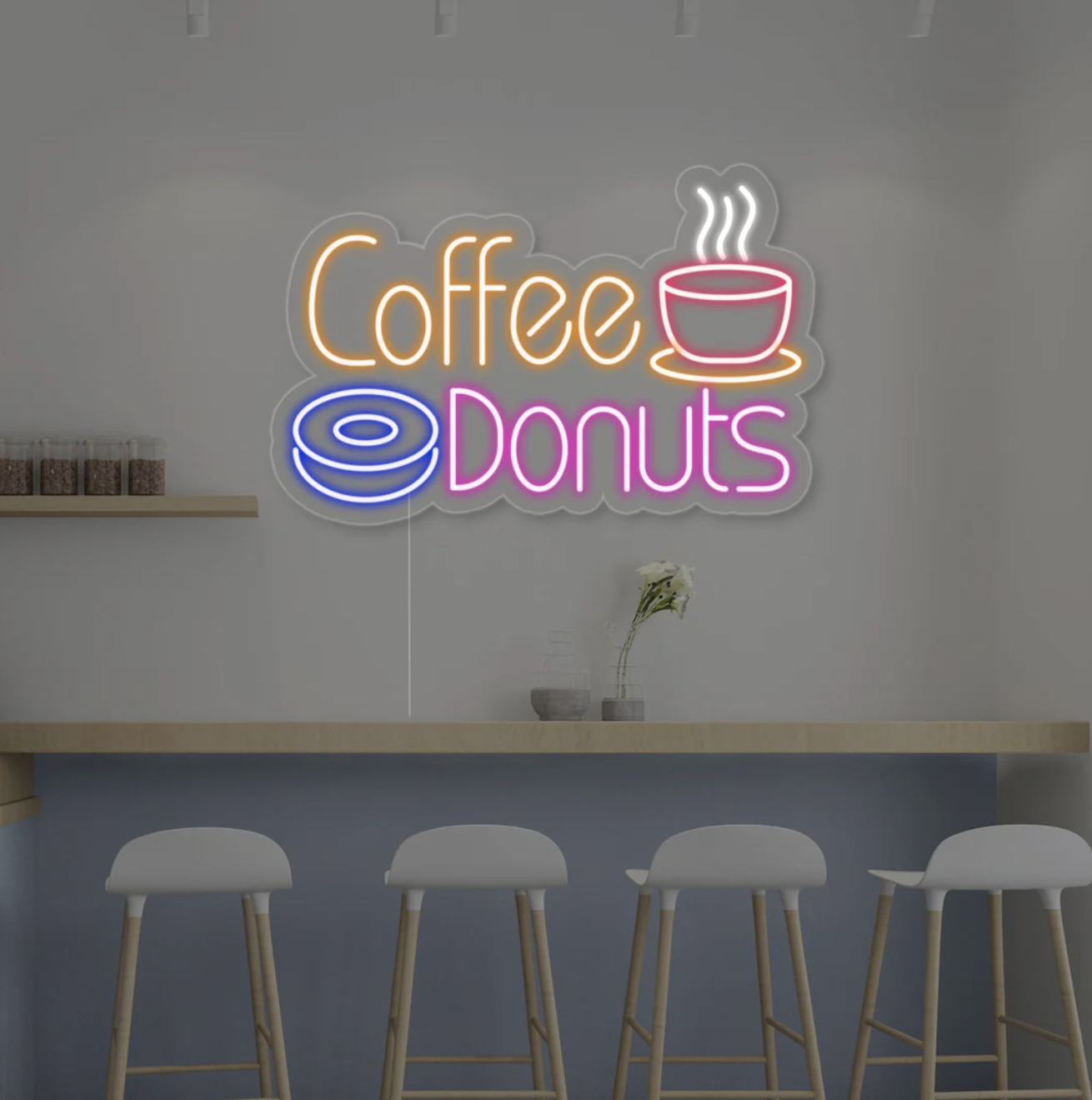 Letrero luminoso de ‘Coffee & Donuts’