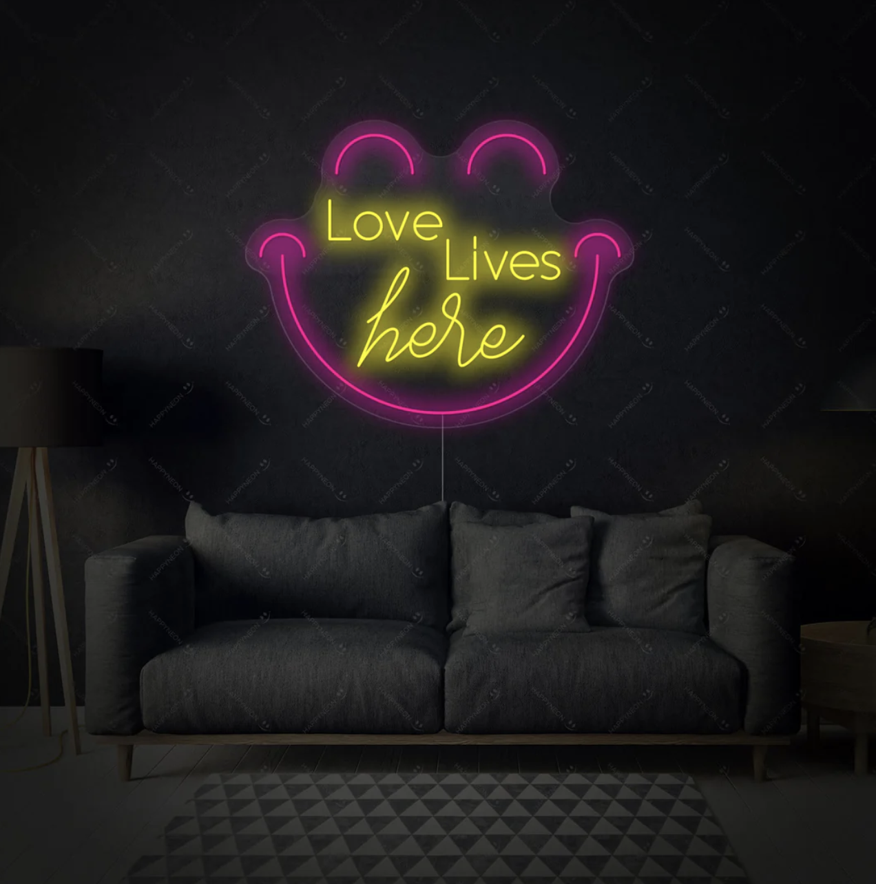 Letrero de neón 'Love Lives Here'