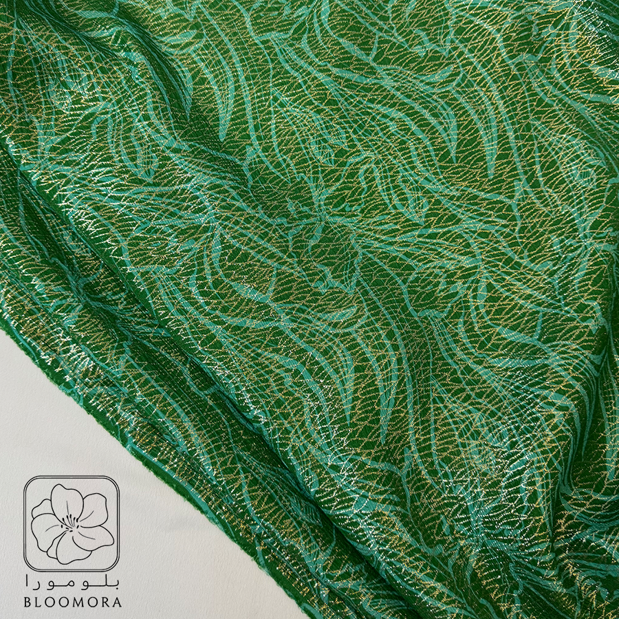 نقشة نباتية باللون الأخضر الزمردي