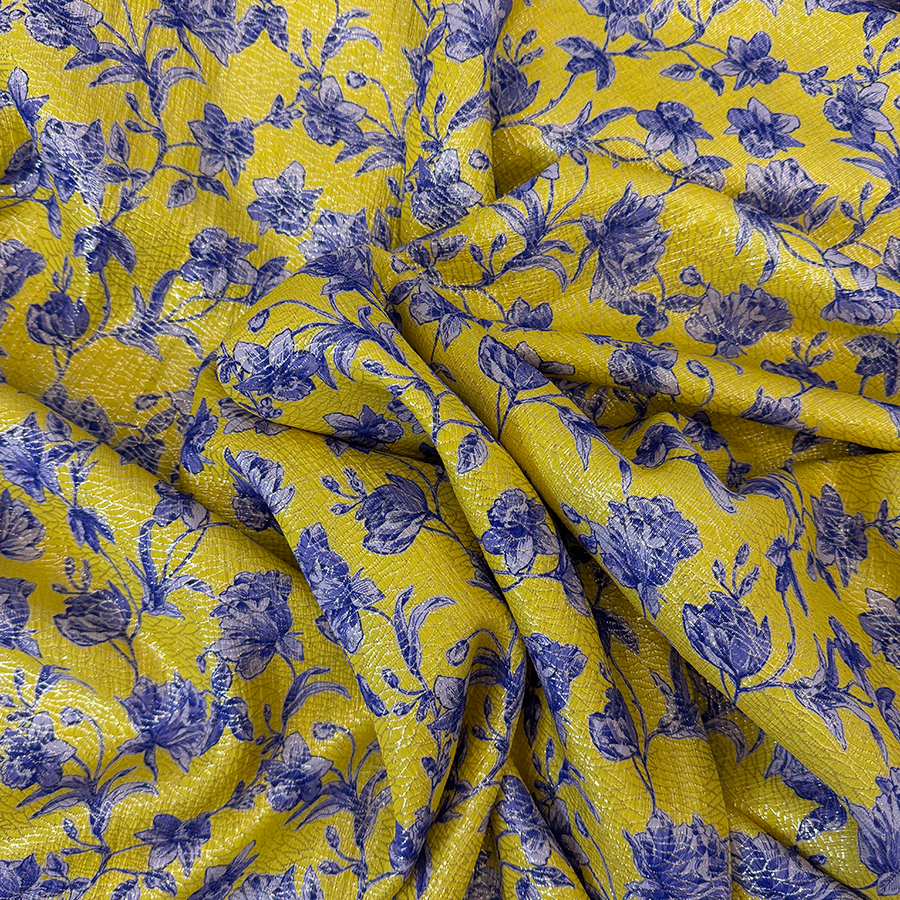 نقشة أزهار زرقاء على خلفية صفراء