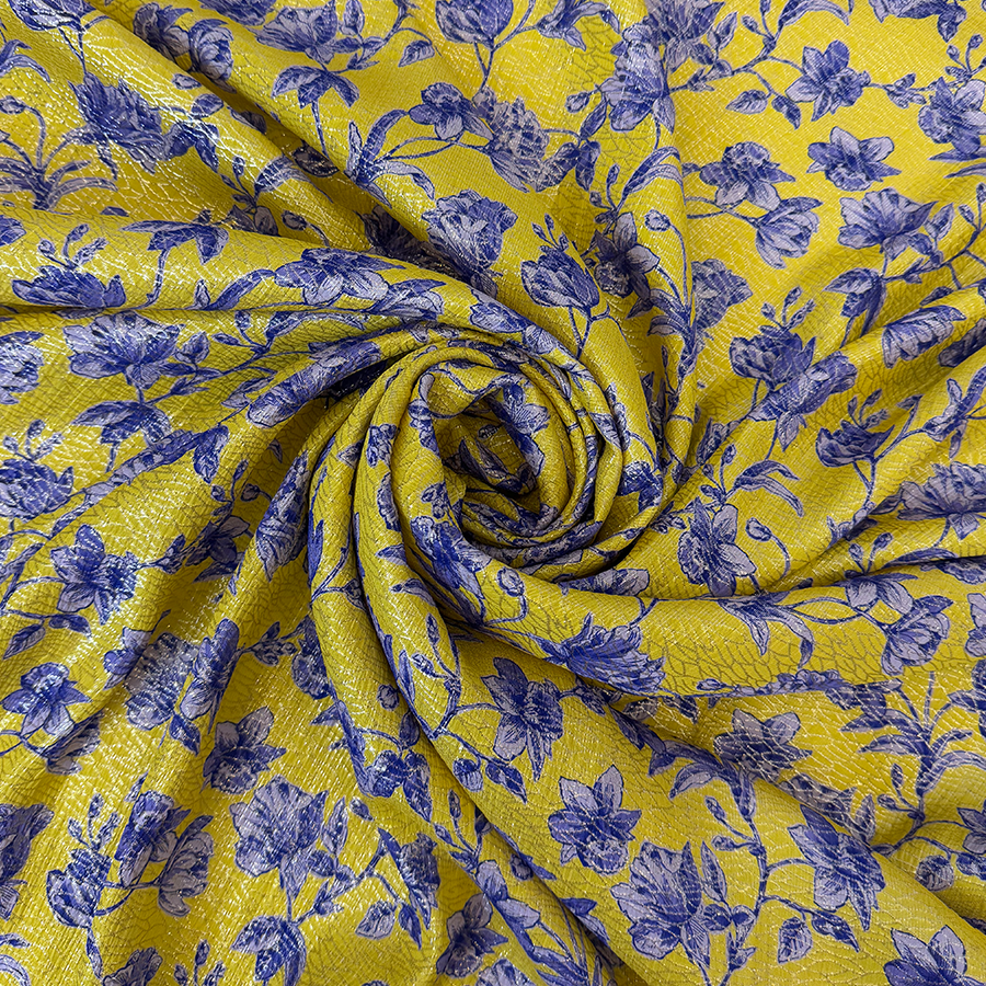 نقشة أزهار زرقاء على خلفية صفراء