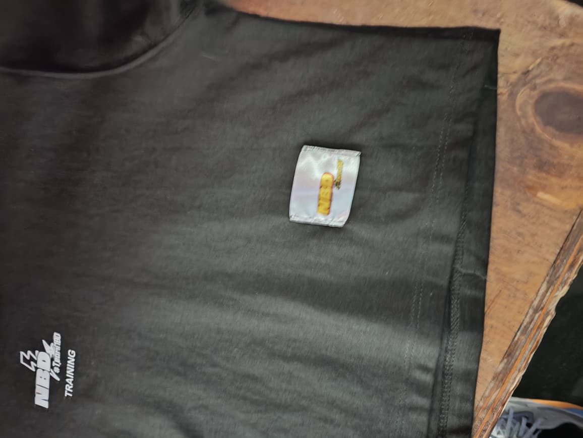 REMERA UNISEX TEAM NBD