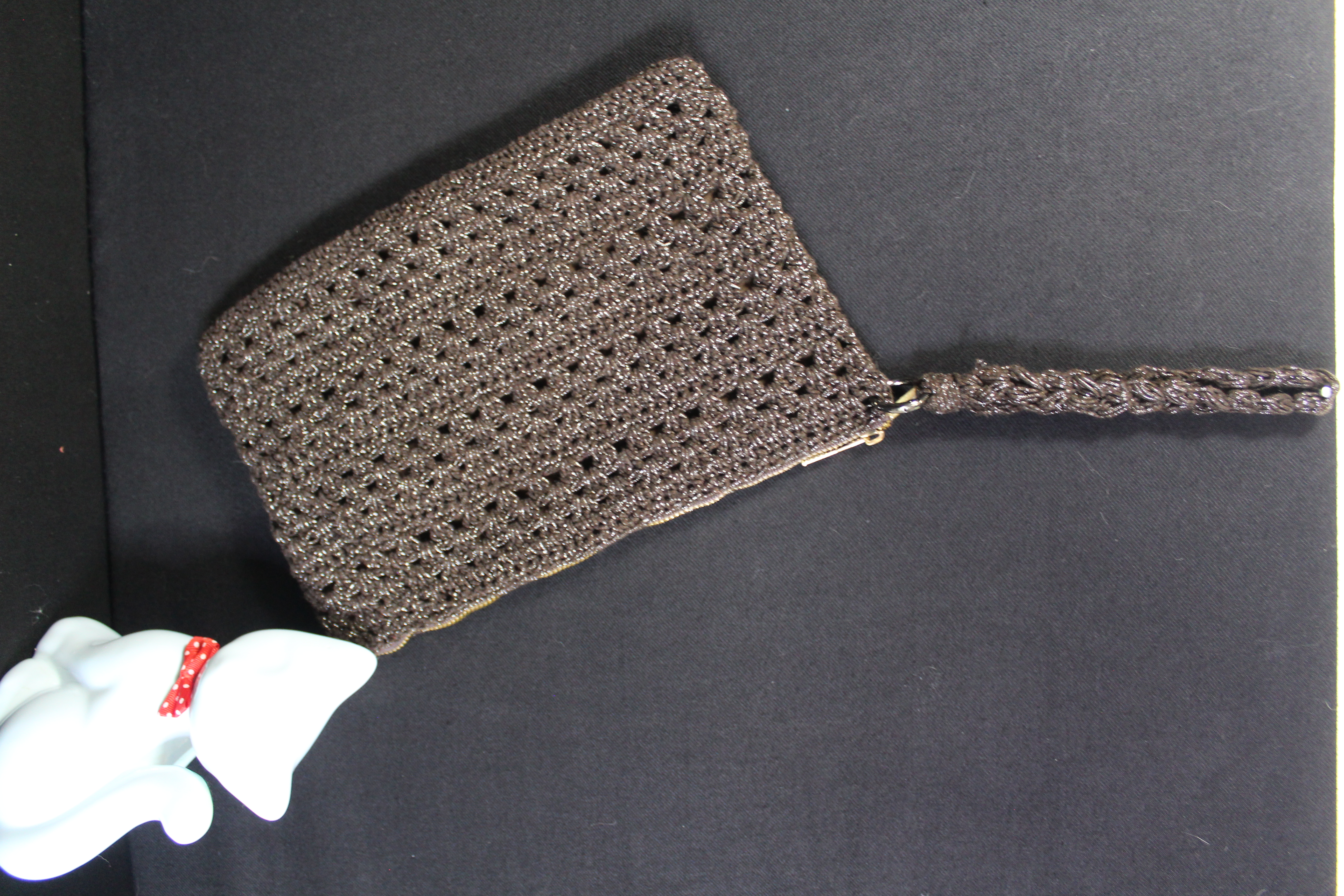 El yapımı örgü cluch çanta