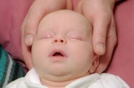 Mom and baby Stillness/Biodynamic Craniosacral treatment session