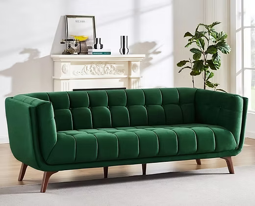 3 Seater Elegant velvet sofa with a tufted back and seat.