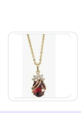 Gold Necklace with Red Gemstone Pendant