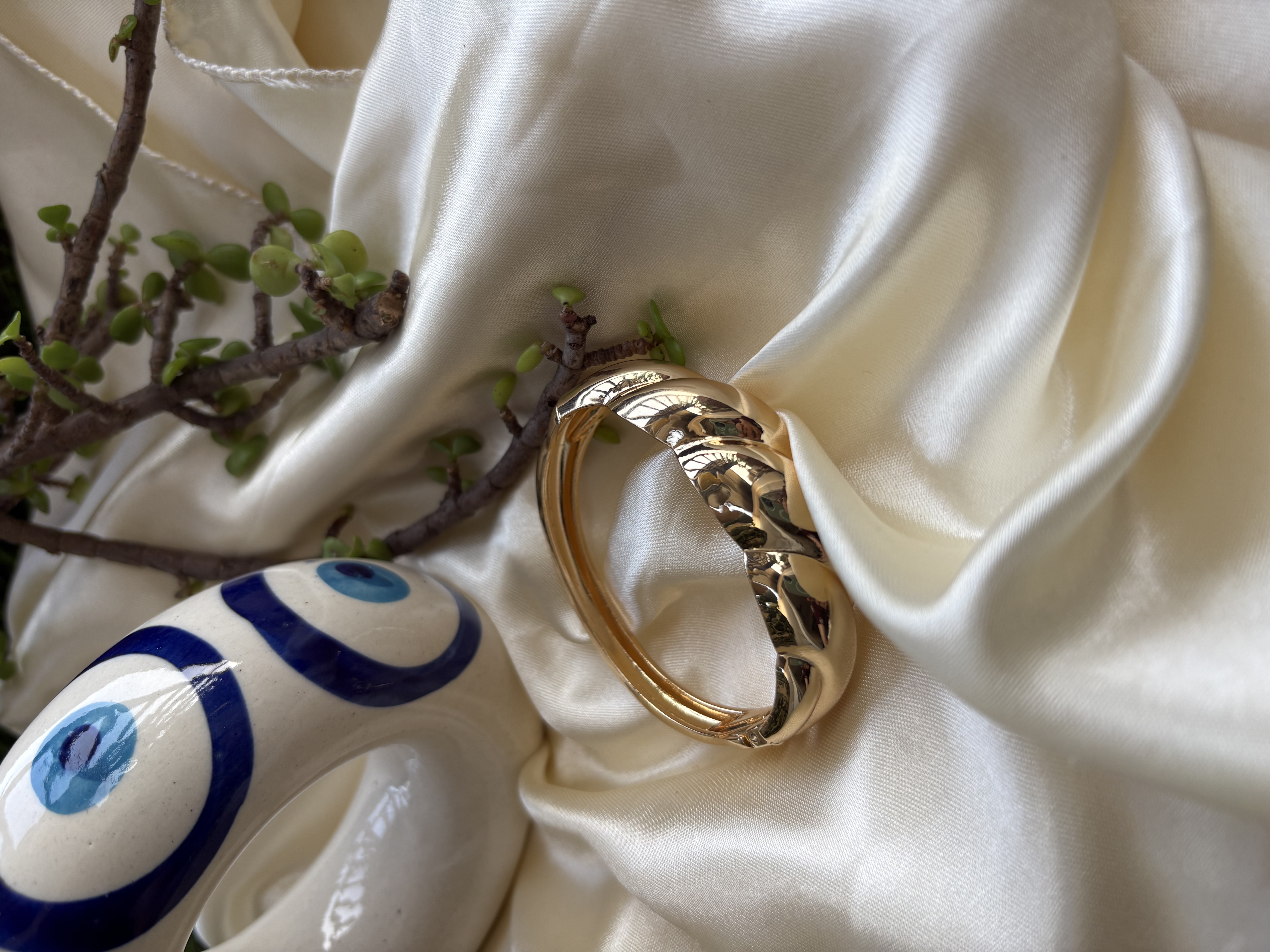 Elegant Gold Braided Bracelet