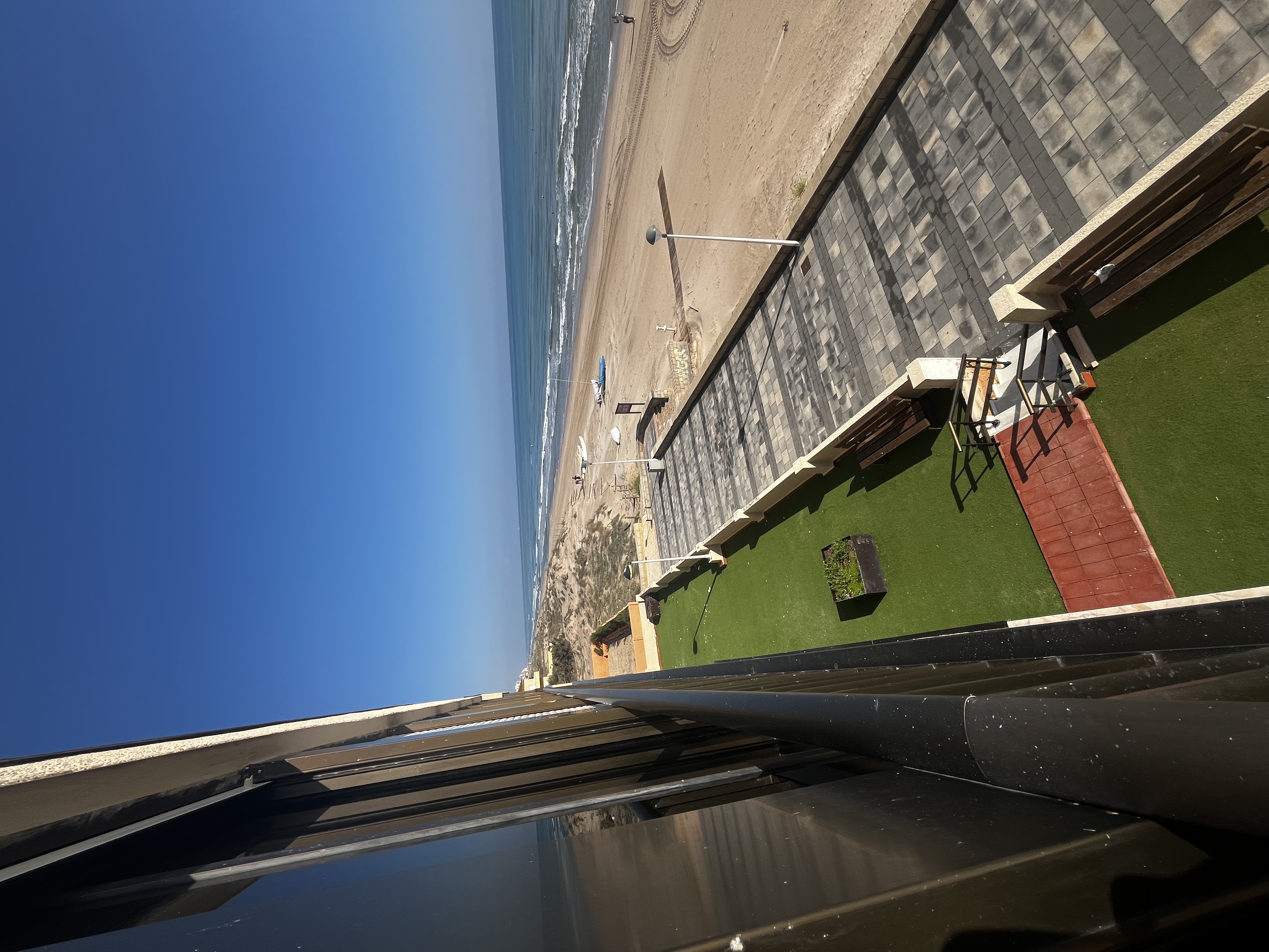 Residential swimming pool first line of a beach