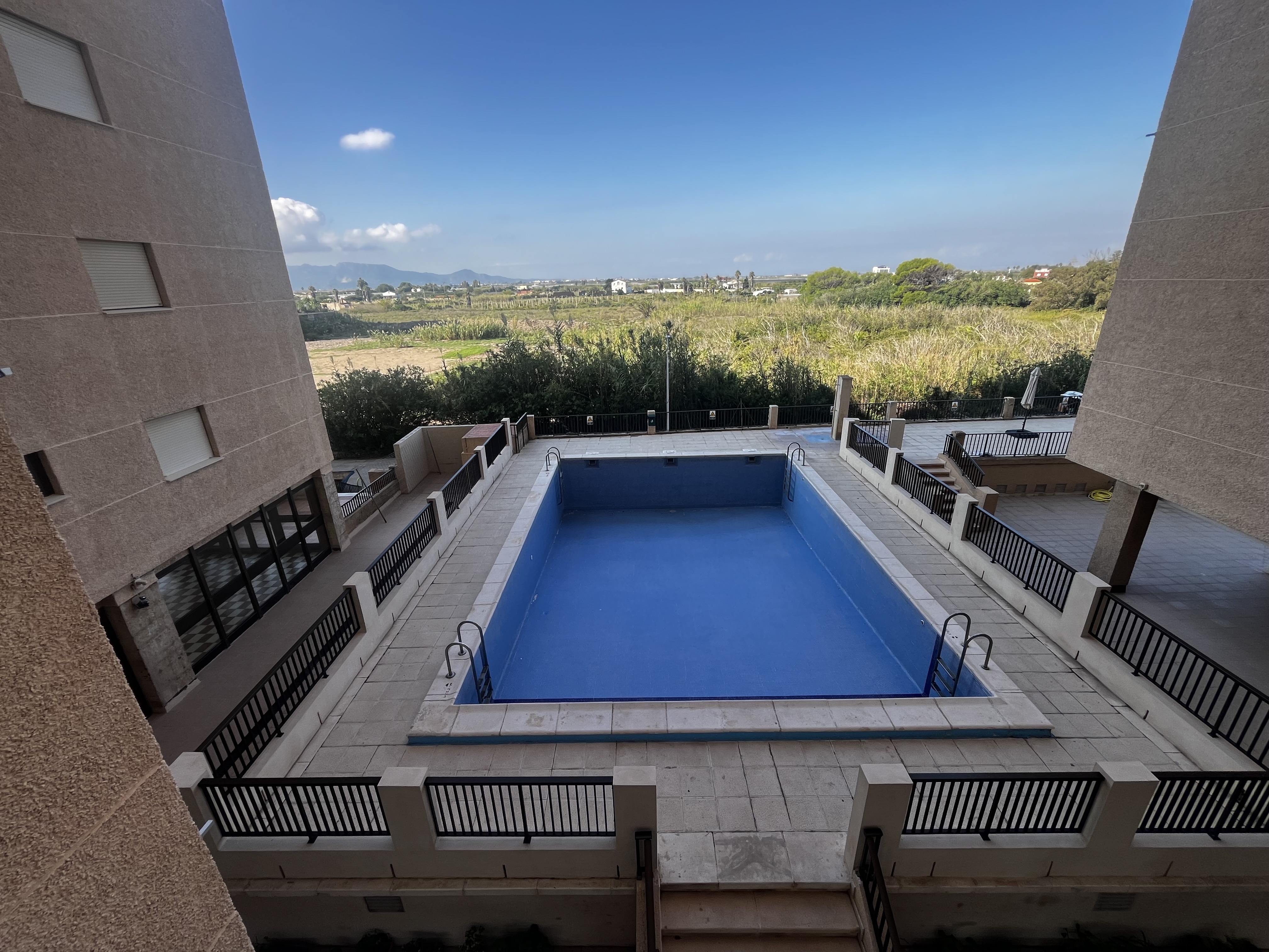 Residential swimming pool first line of a beach