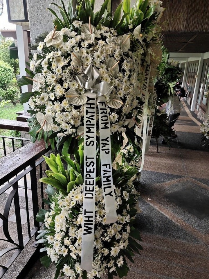  graceful mums and striking anthuriums Funeral flower arrangement