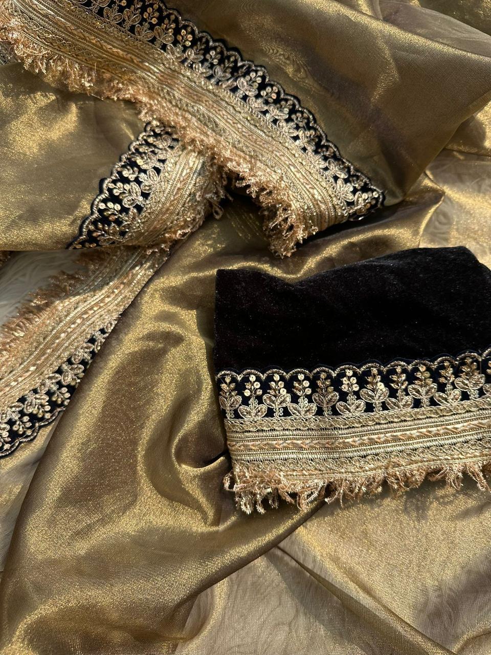 Glamorous Antique Gold Tissue Saree with Black Embroidered Border